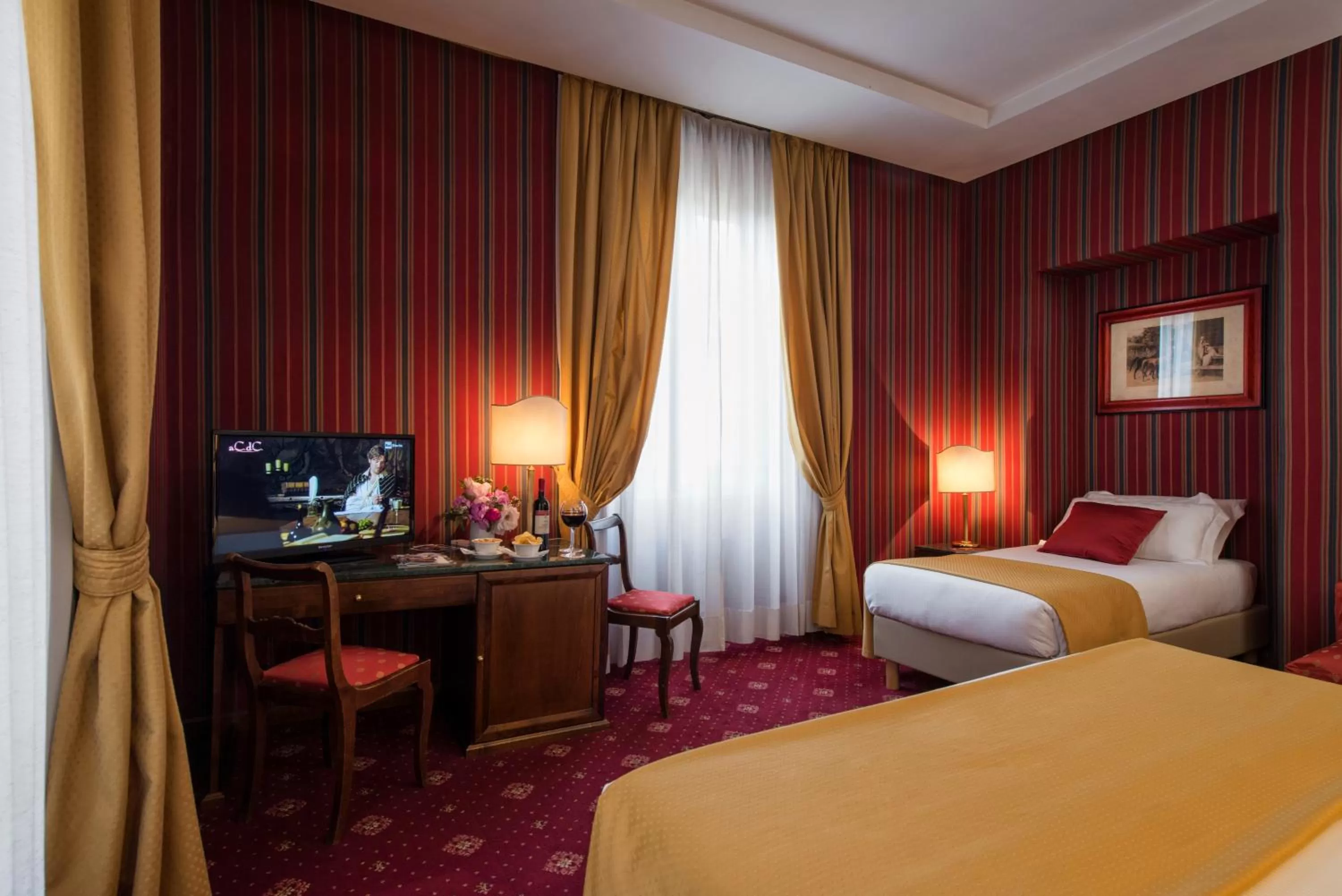 Bed in Atlante Garden Hotel