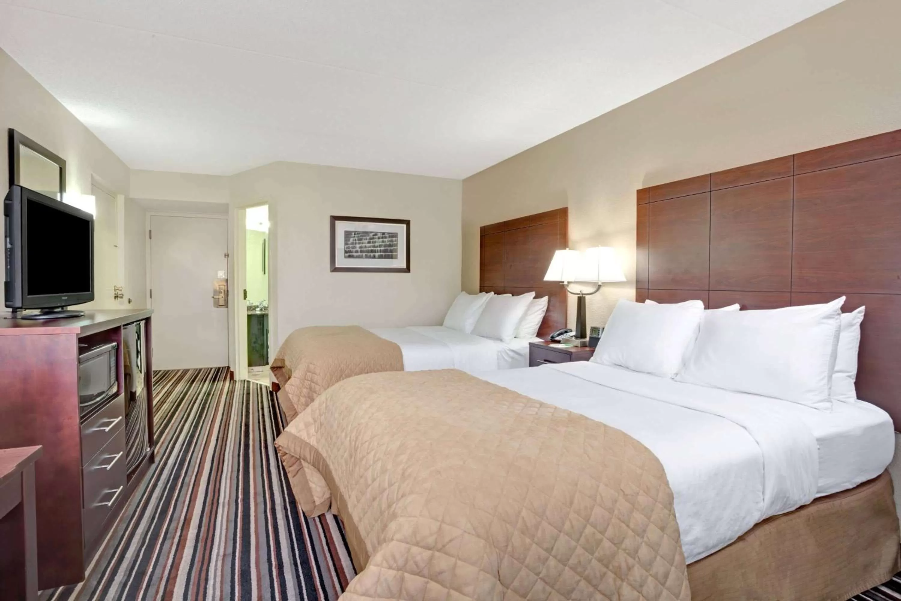 Photo of the whole room, Bed in Wyndham Garden Charlotte Airport Southeast