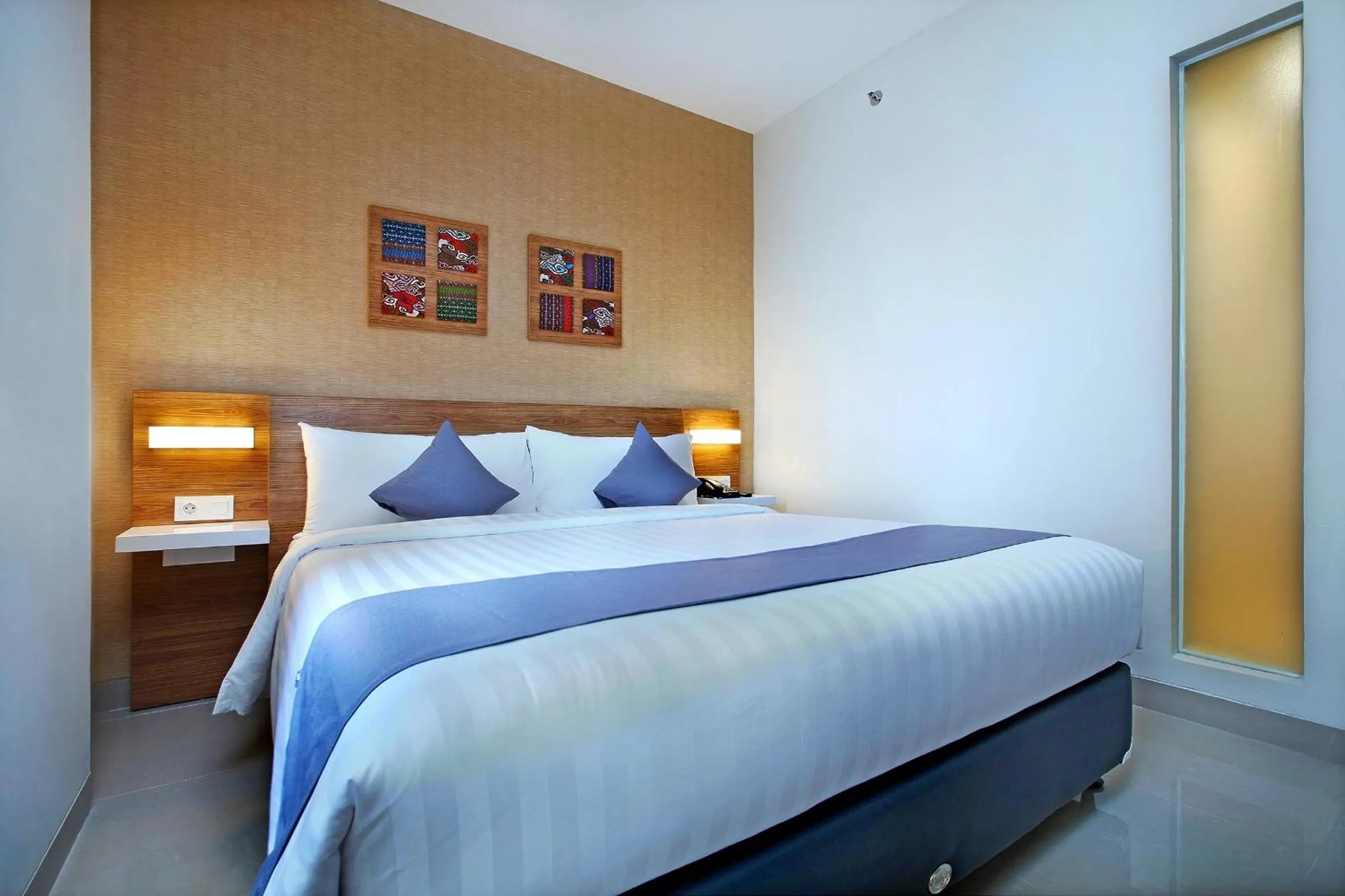 Decorative detail, Bed in Hotel NEO Cirebon by ASTON