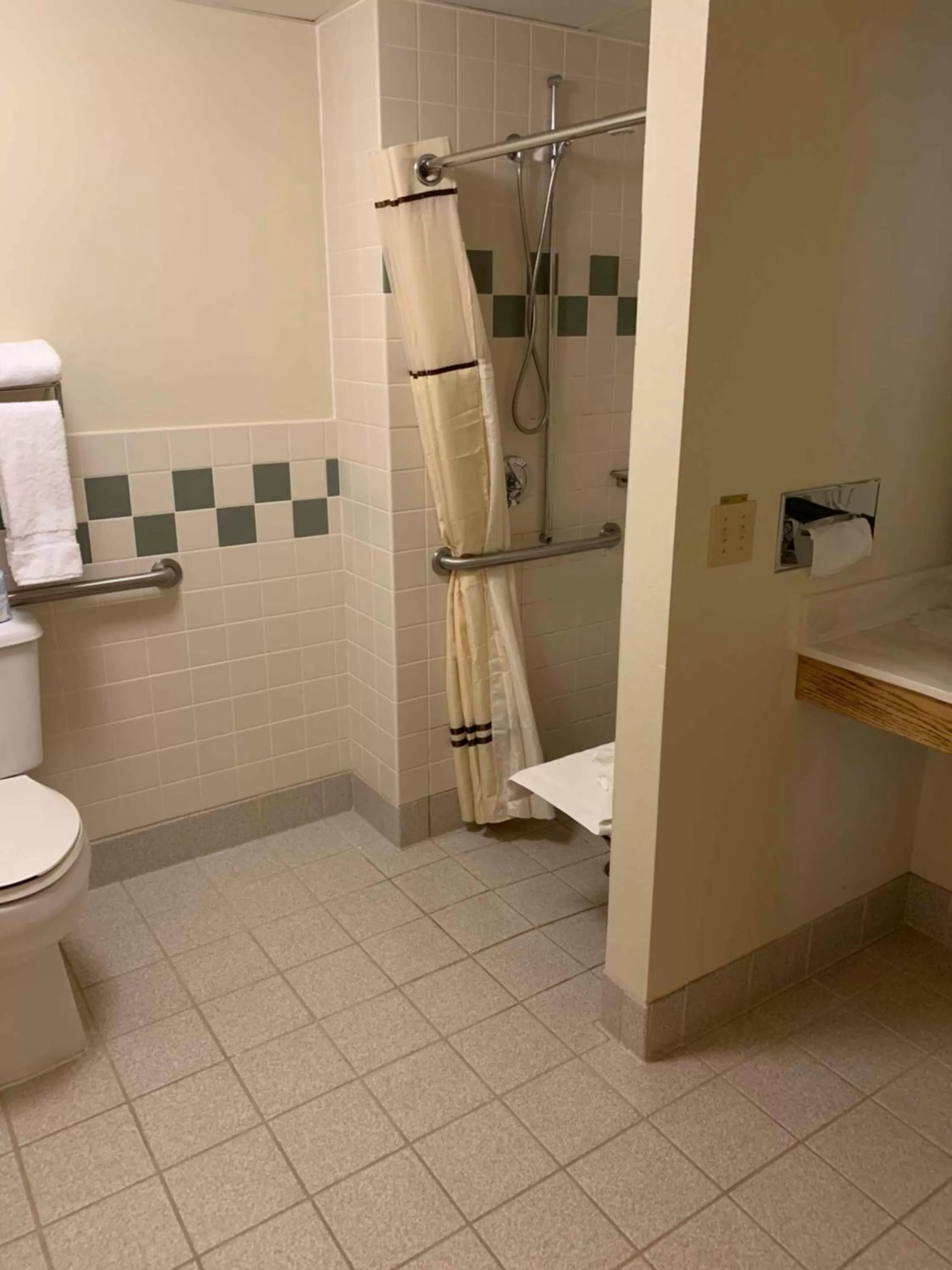 Bathroom in AmericInn by Wyndham Cody