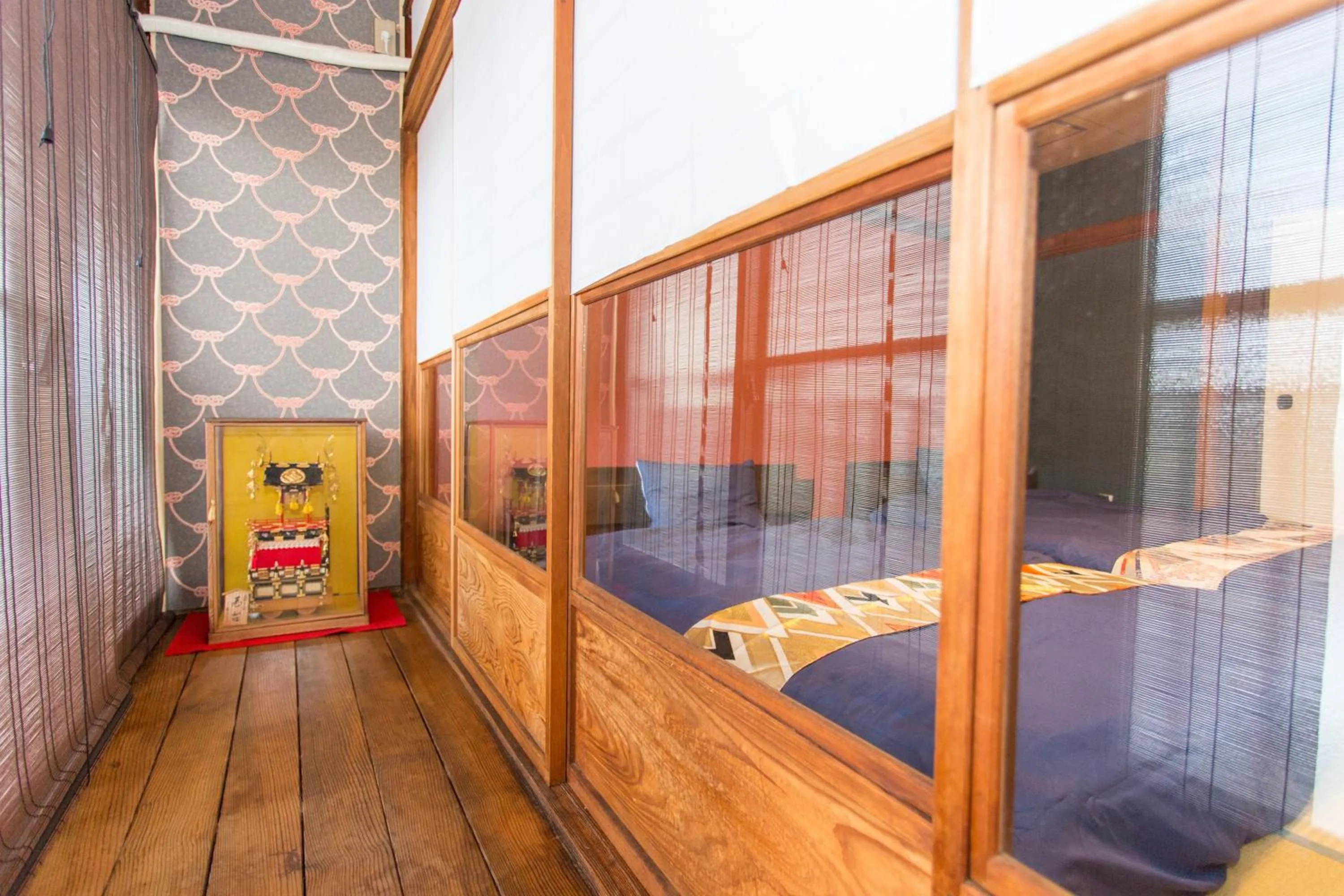 Bed in Guest House Kyorakuya Kinkakuji