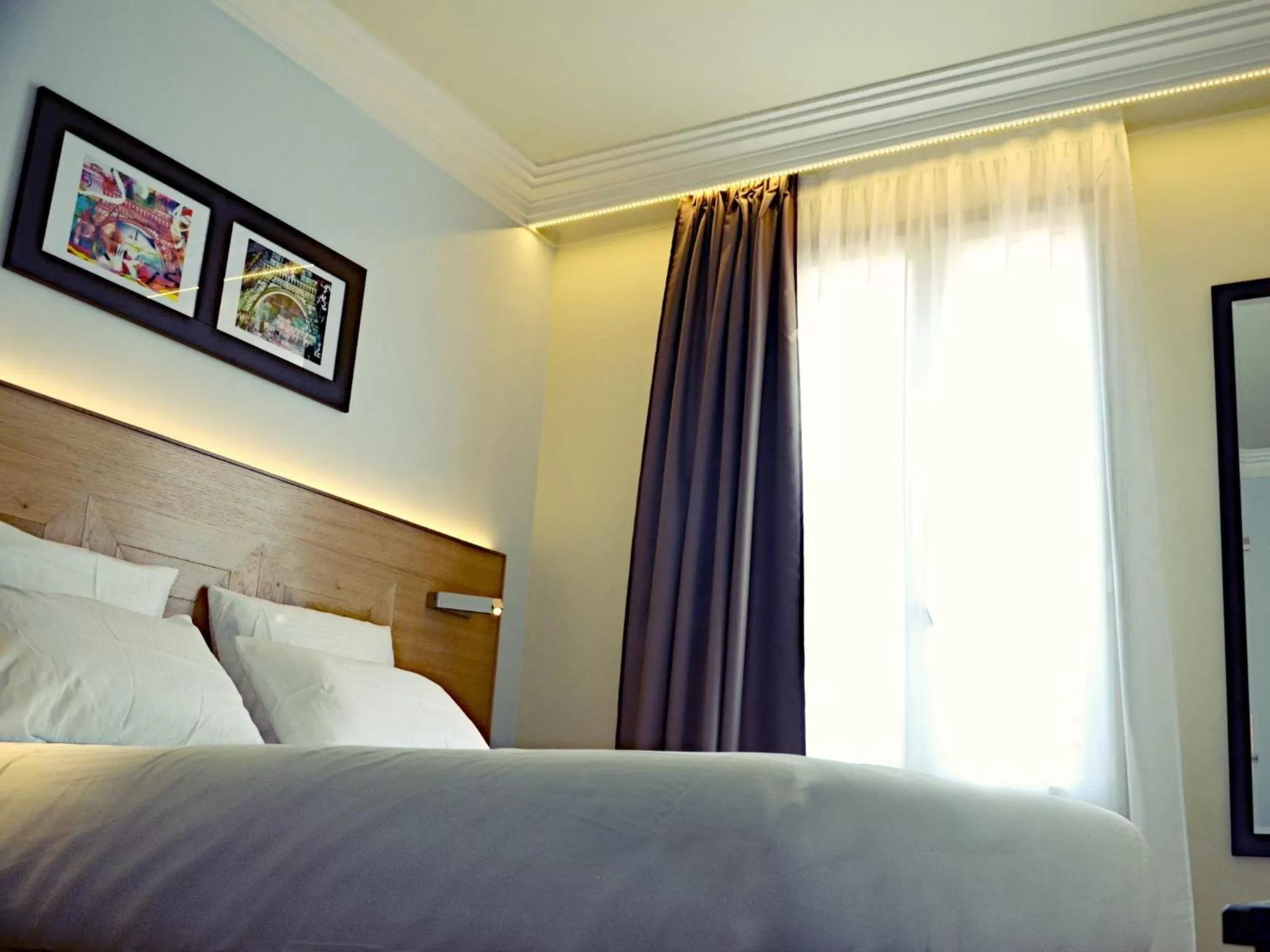 Bed in Hôtel Eiffel XV