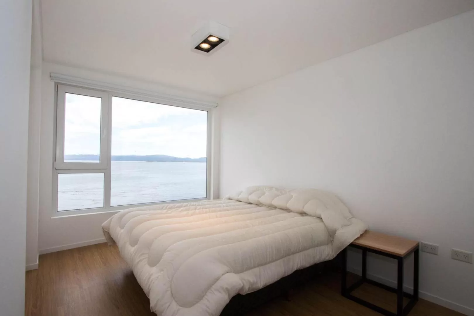 Bed in De la Costa Apartamentos