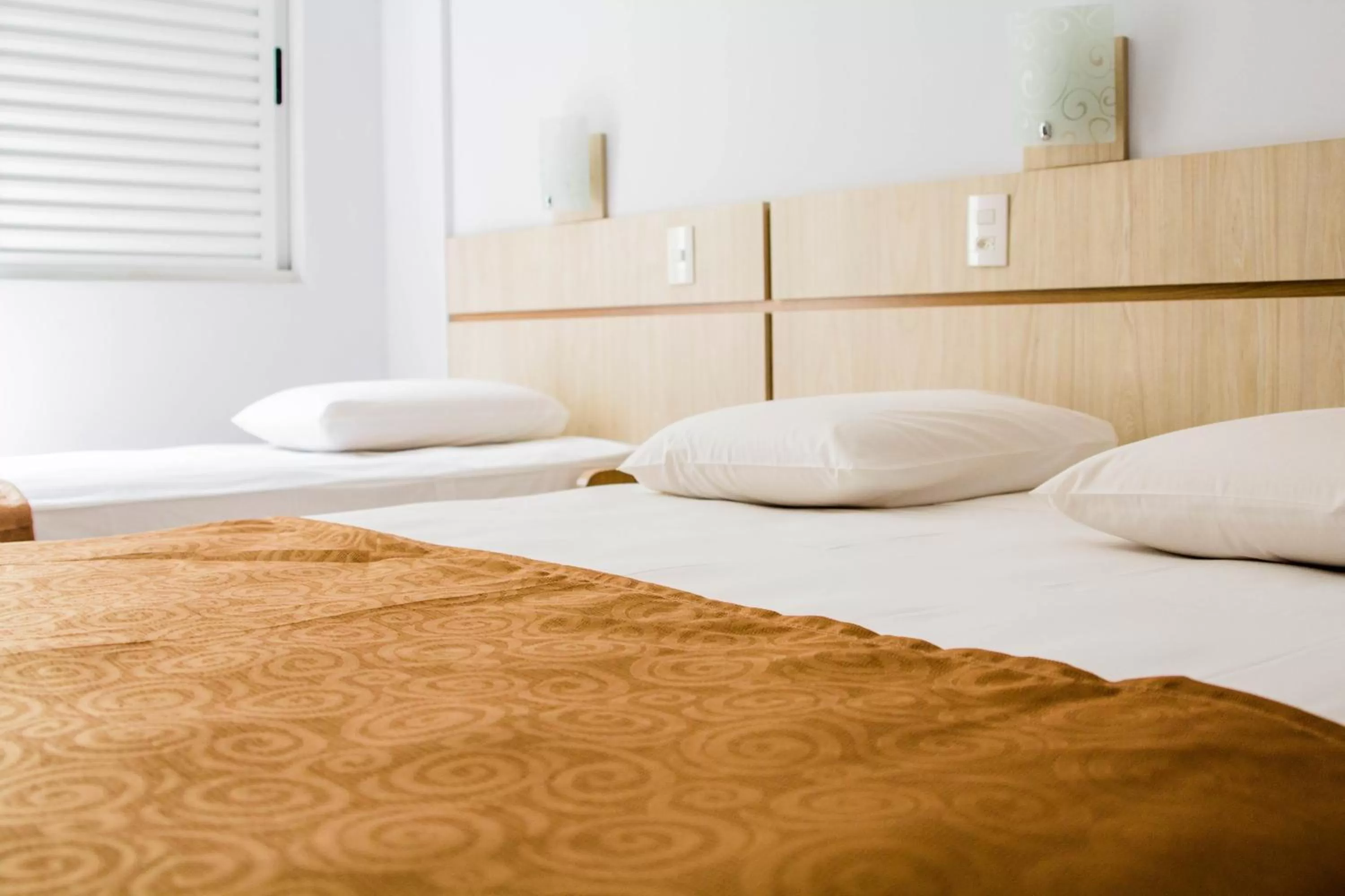 Bed in Hotel Baviera Iguassu