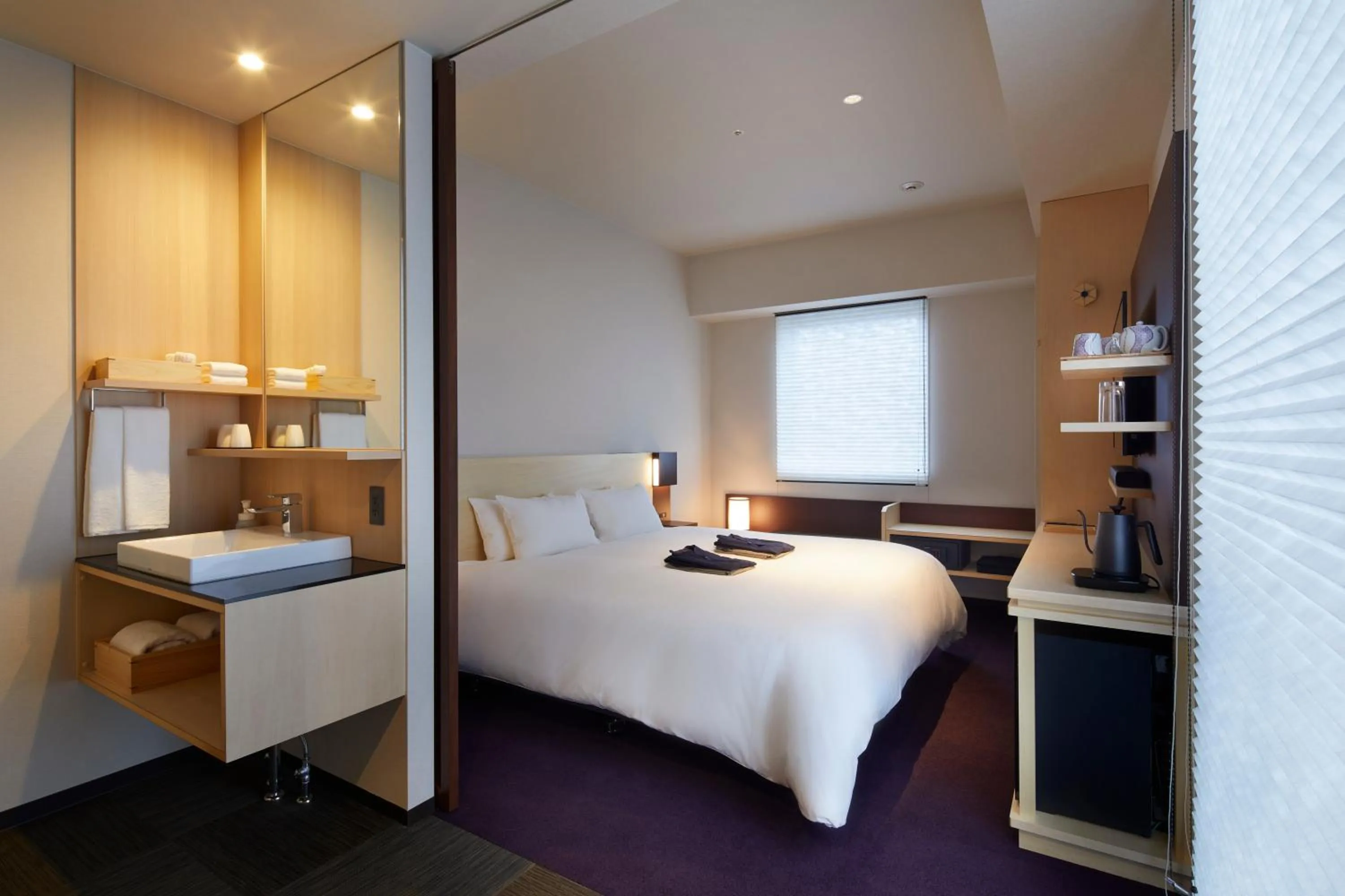 Photo of the whole room, Bed in HOTEL AMANEK Kanazawa