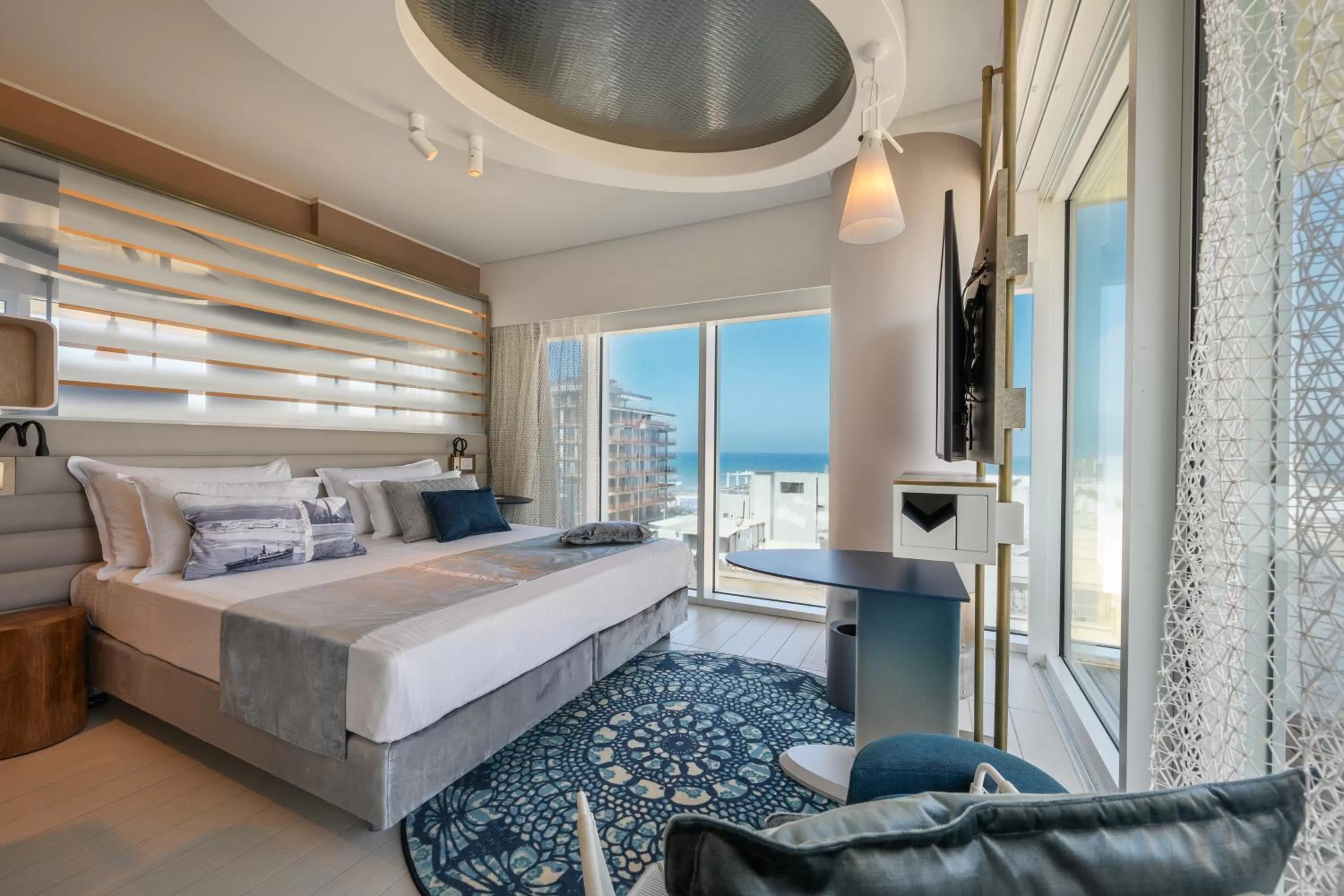 Sea view, Bed in Port Tower by Isrotel Design