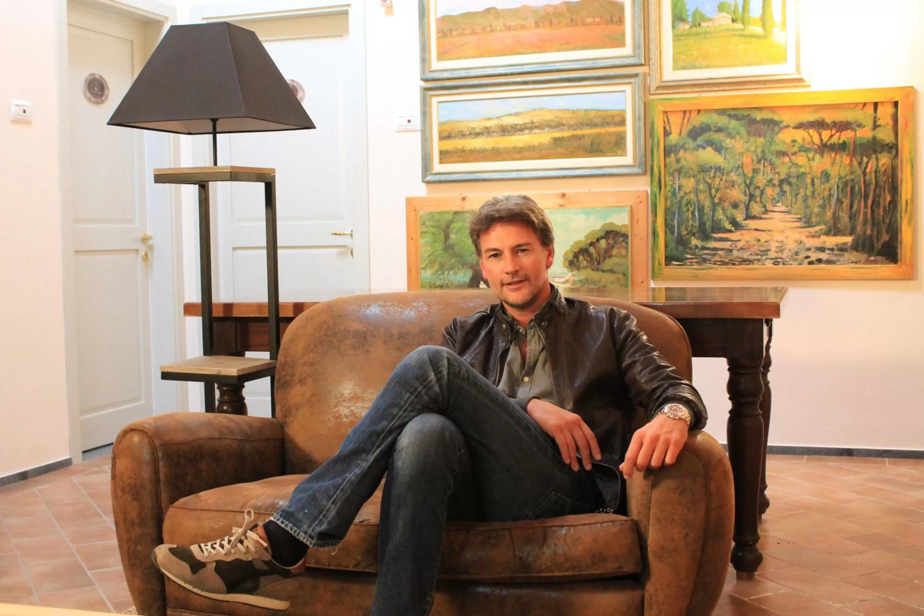 Communal lounge/ TV room in Locanda La Bottega del Parco