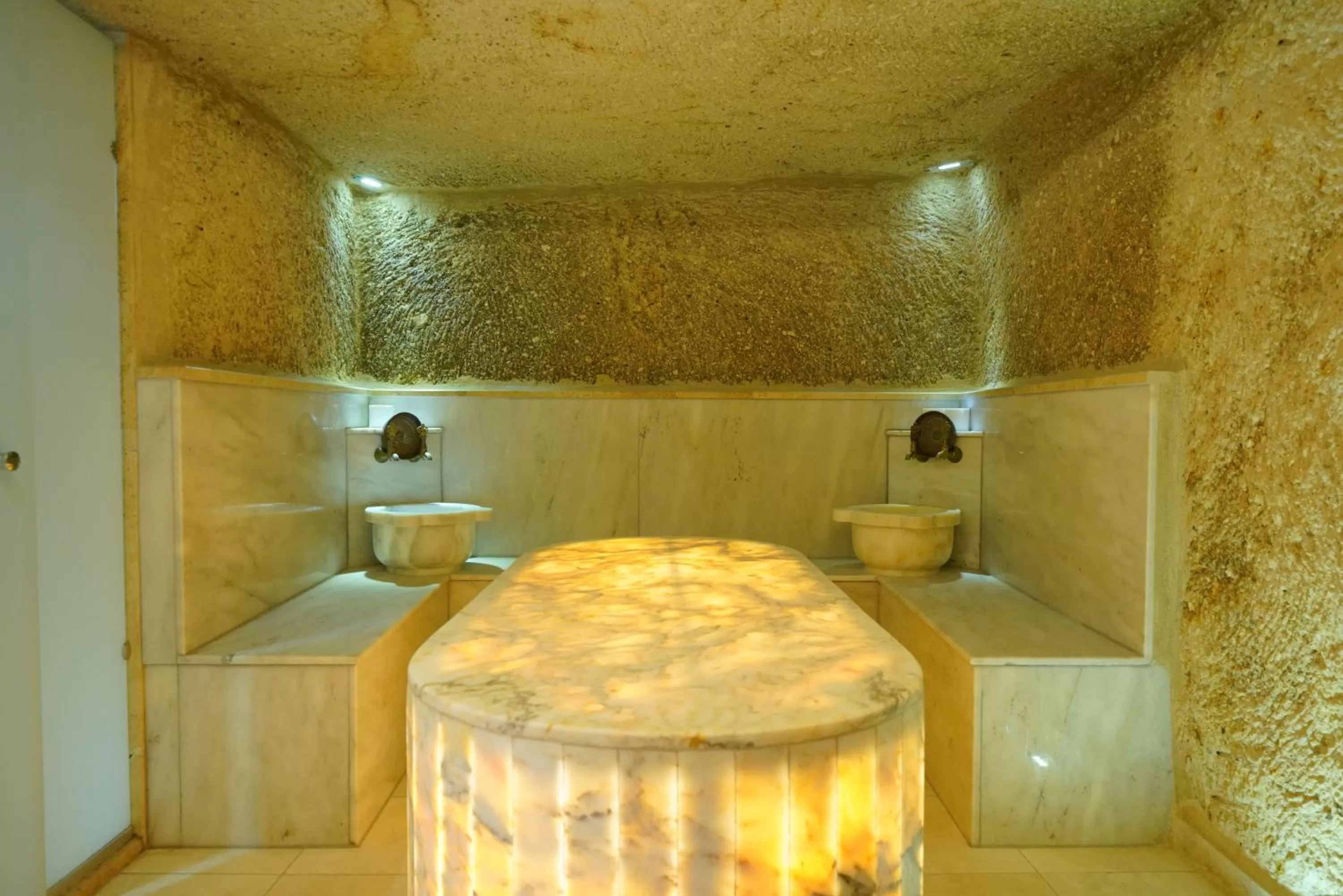 Public Bath in Shoestring Cave House