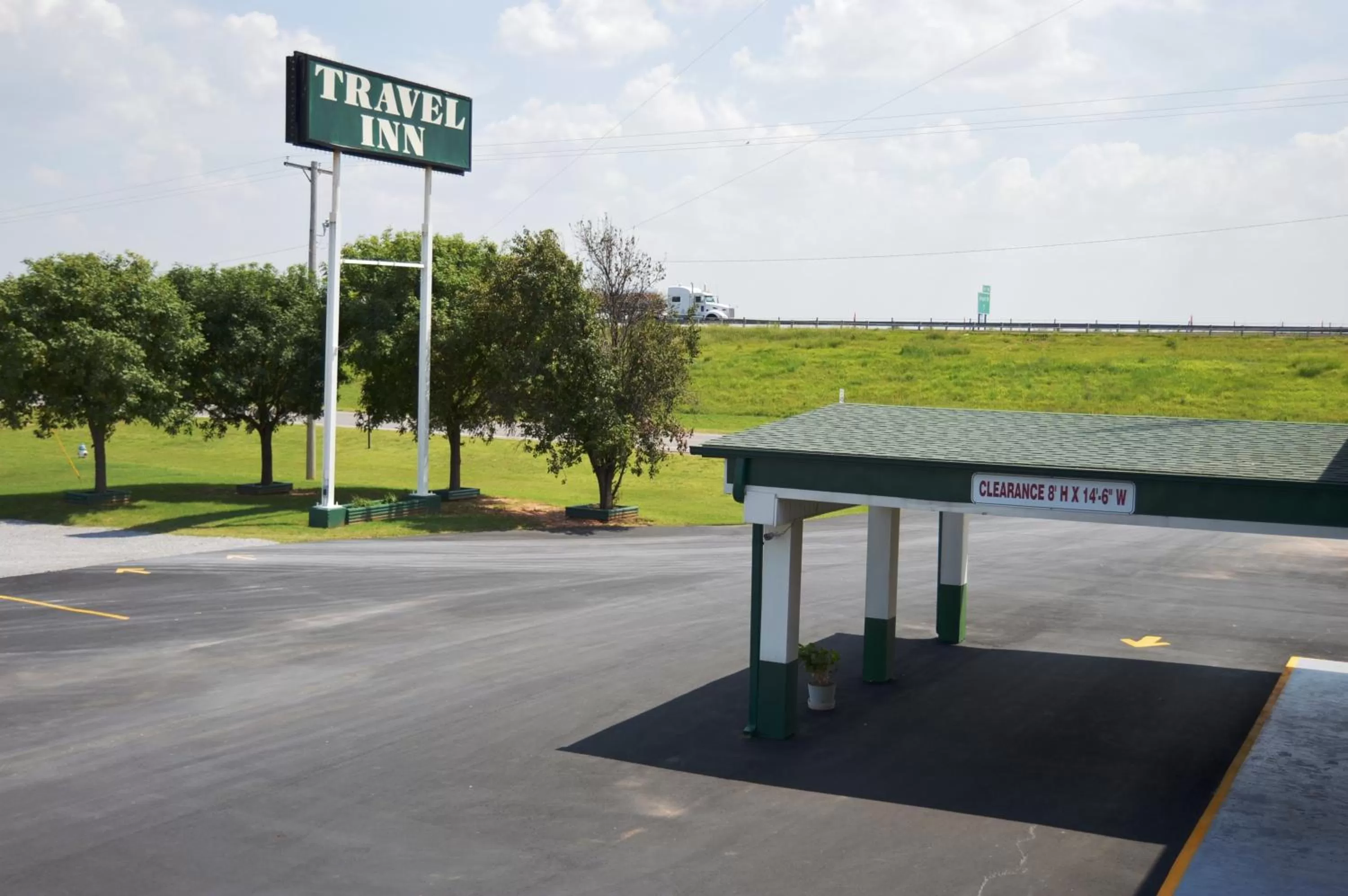Property logo or sign in Travel Inn Weatherford