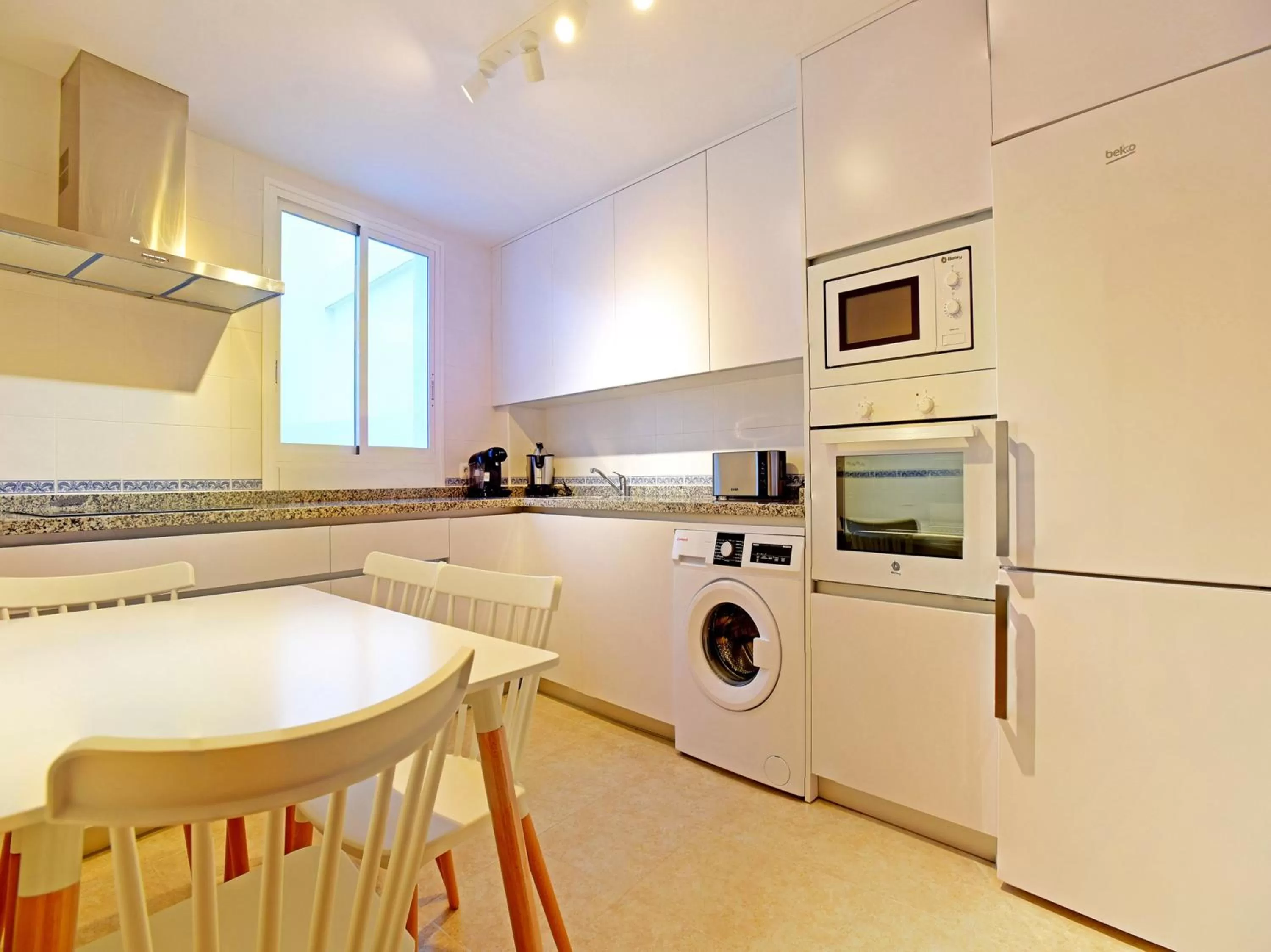 Kitchen or kitchenette in Apartamentos Santiago