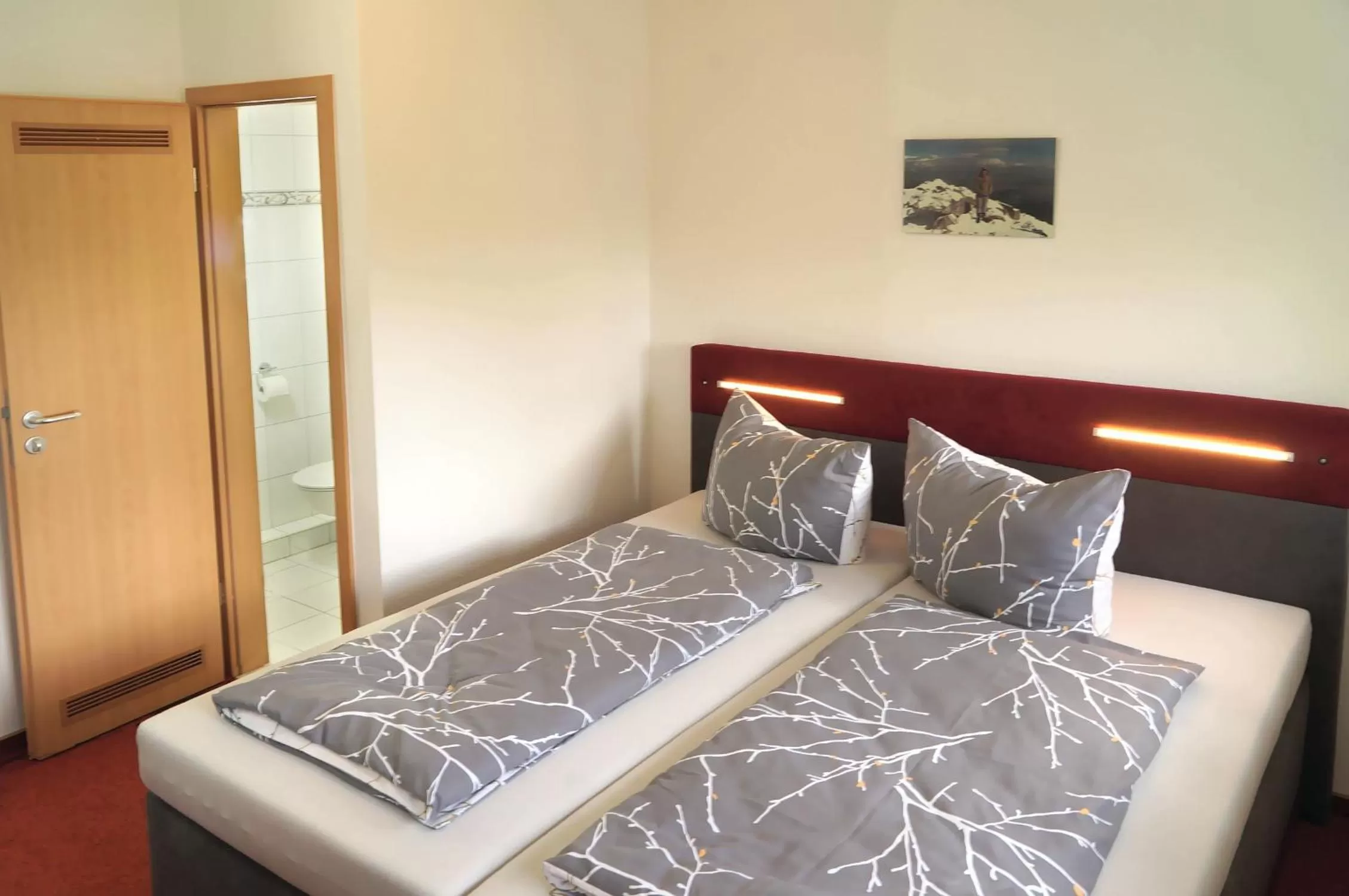 Bed in Erzgebirgshotel Misnia Bärenfels