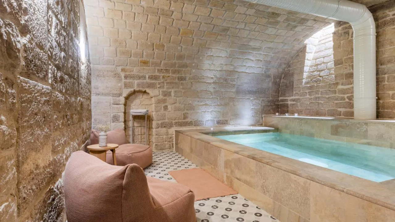 Swimming pool in Le Petit Beaumarchais Hotel & Spa