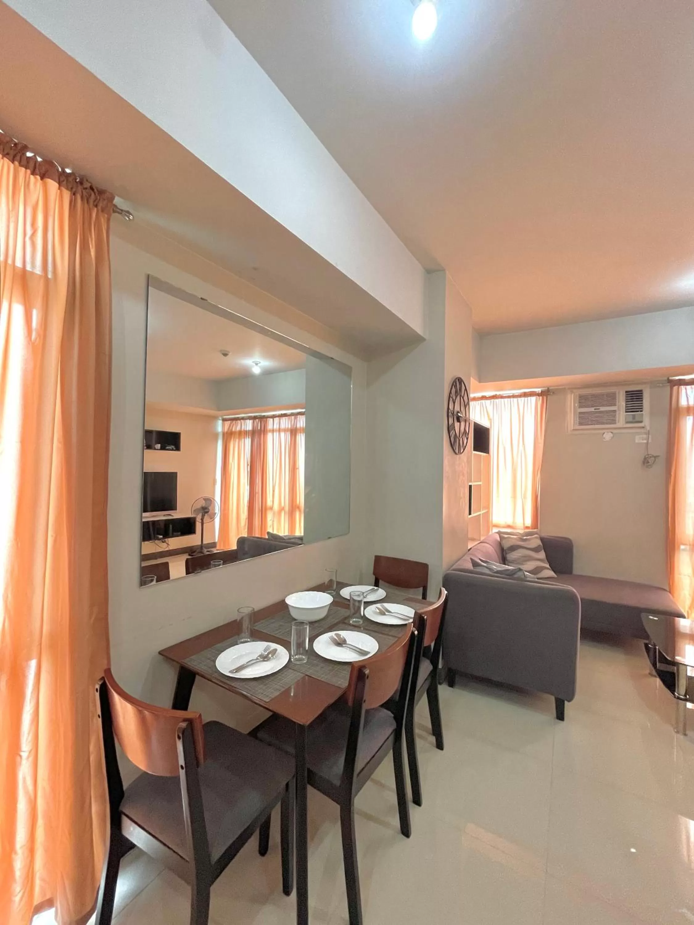 TV and multimedia, Dining Area in Cubao, Quezon City Condo Staycation (wifi and netflix ready)