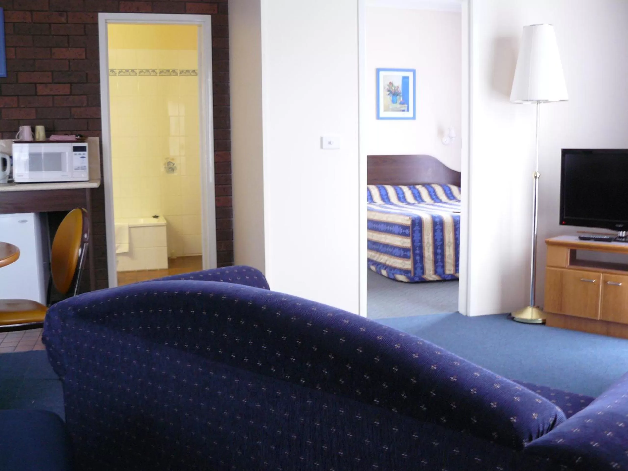 Living room, Bed in Australia Park Motel