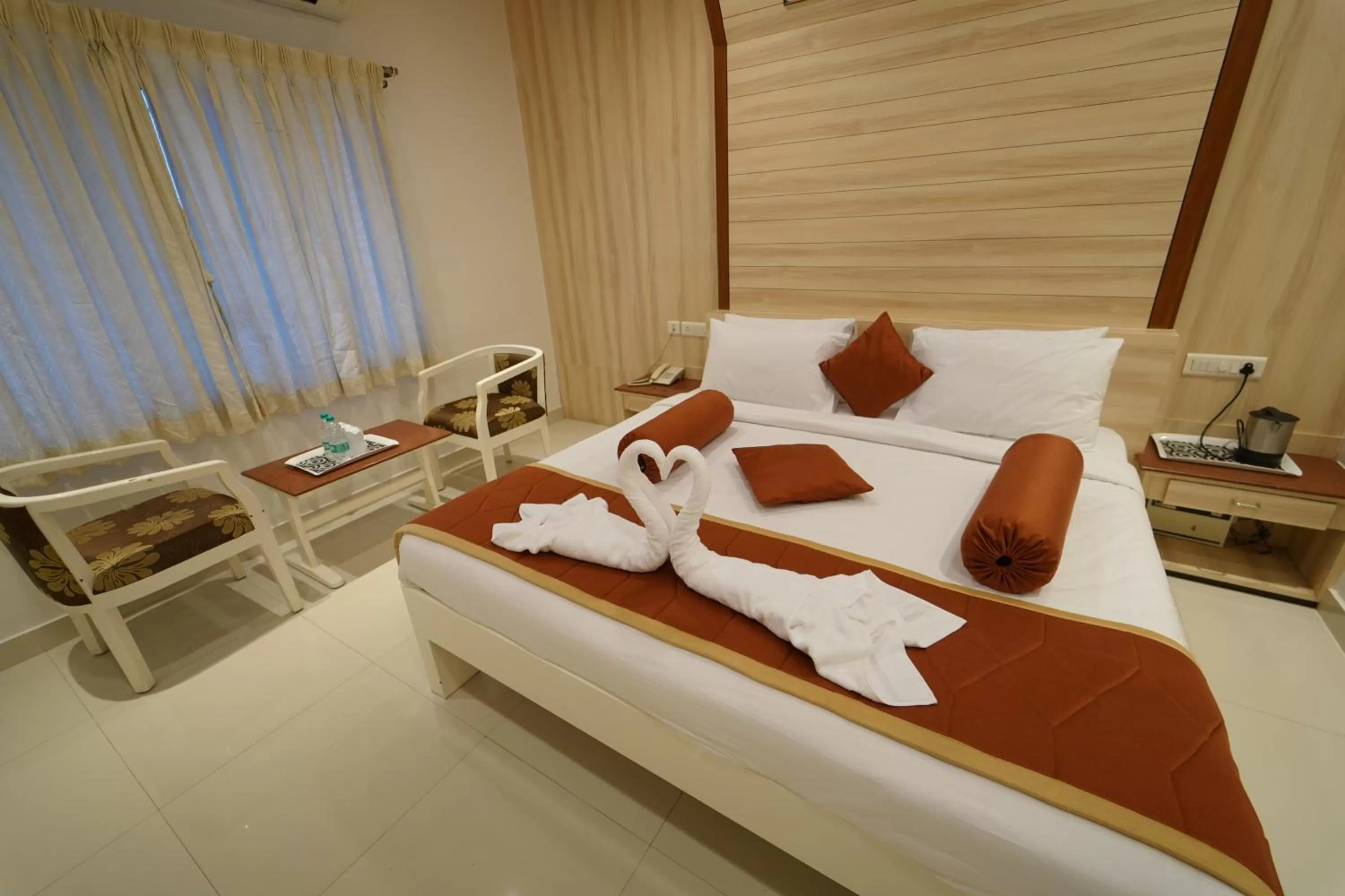 Photo of the whole room, Bed in Hotel Palmyra Grand Inn