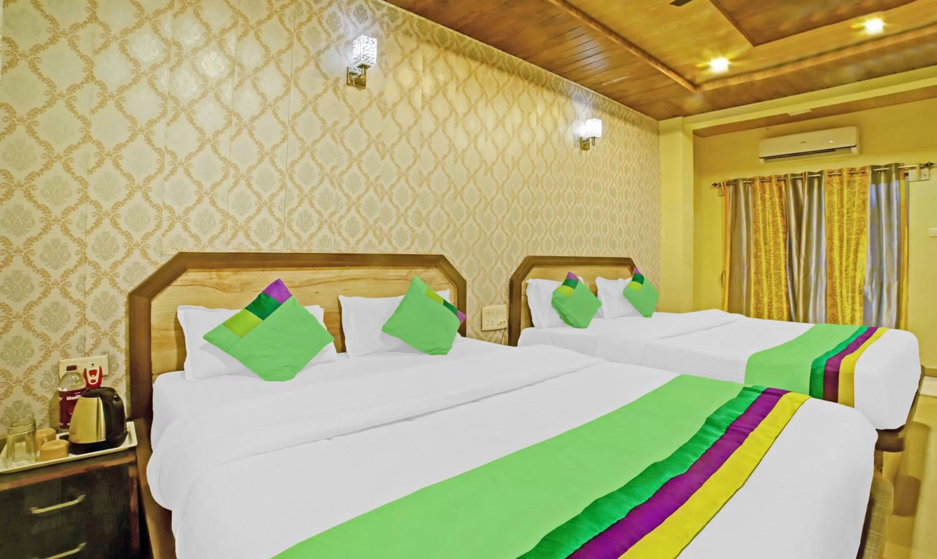 Bedroom, Bed in Treebo Balaji Excellency with Pool & Spa