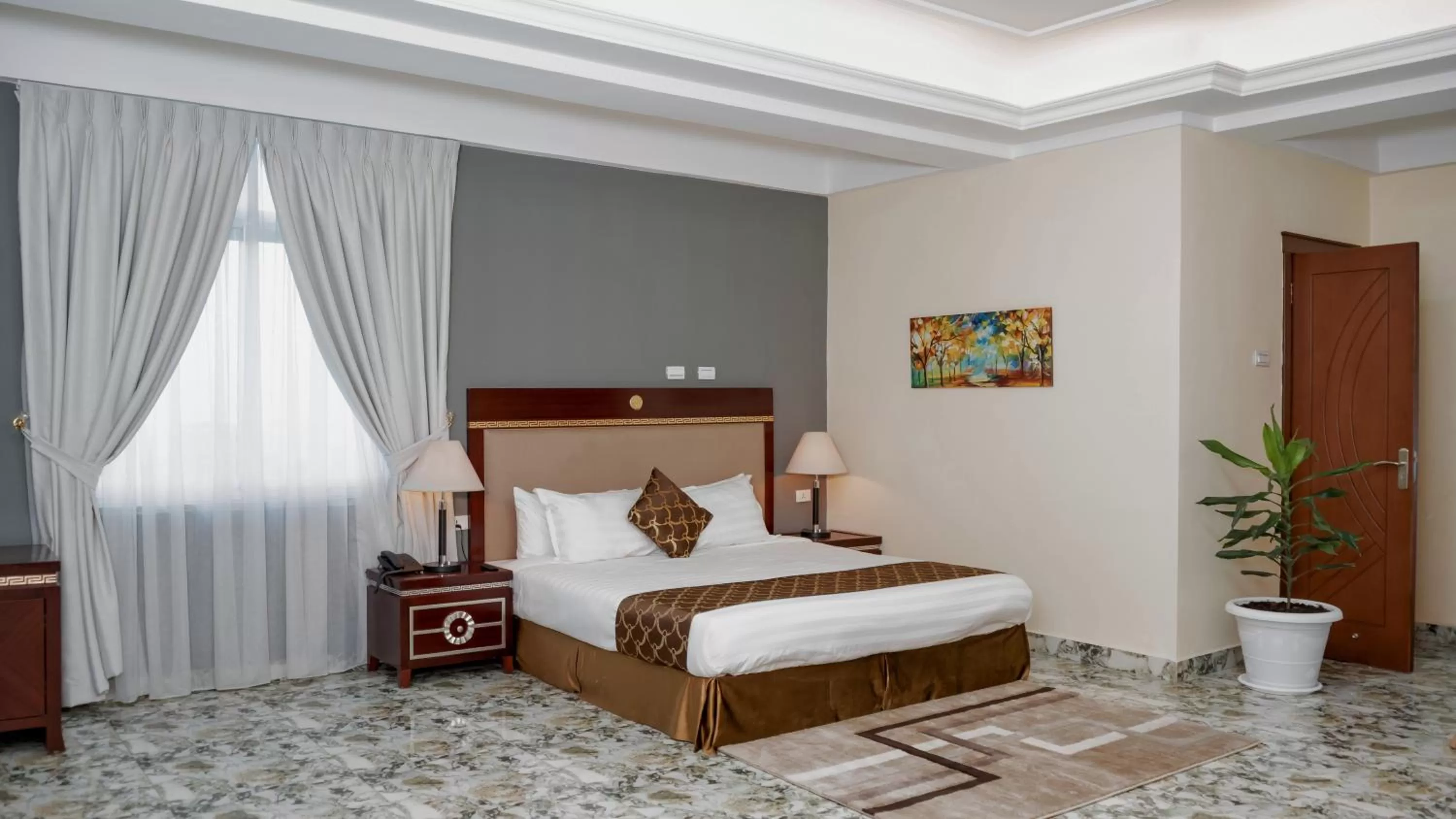 Bed in Dabi Hotel & Apartments