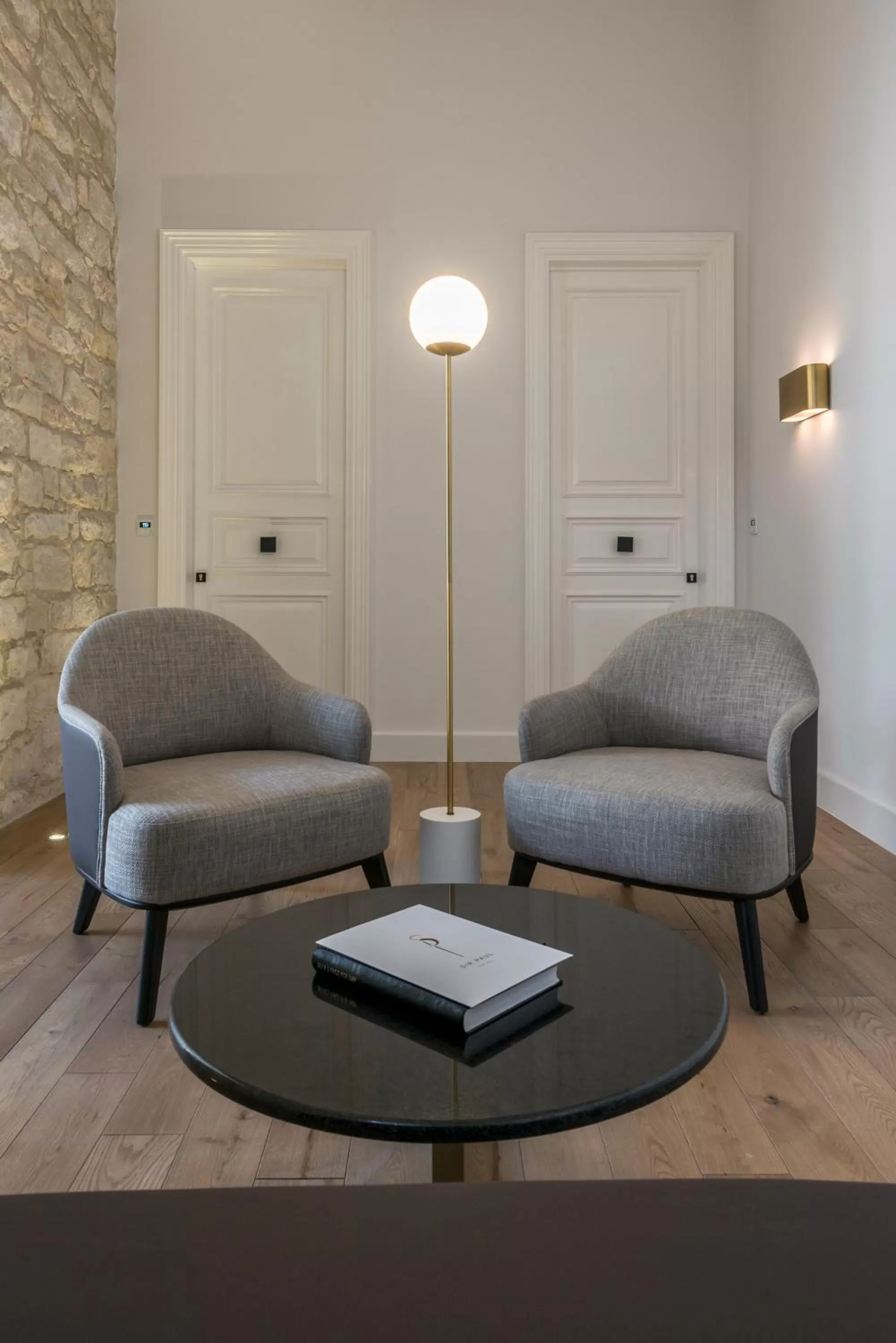 Communal lounge/ TV room in S Paul City Hotel