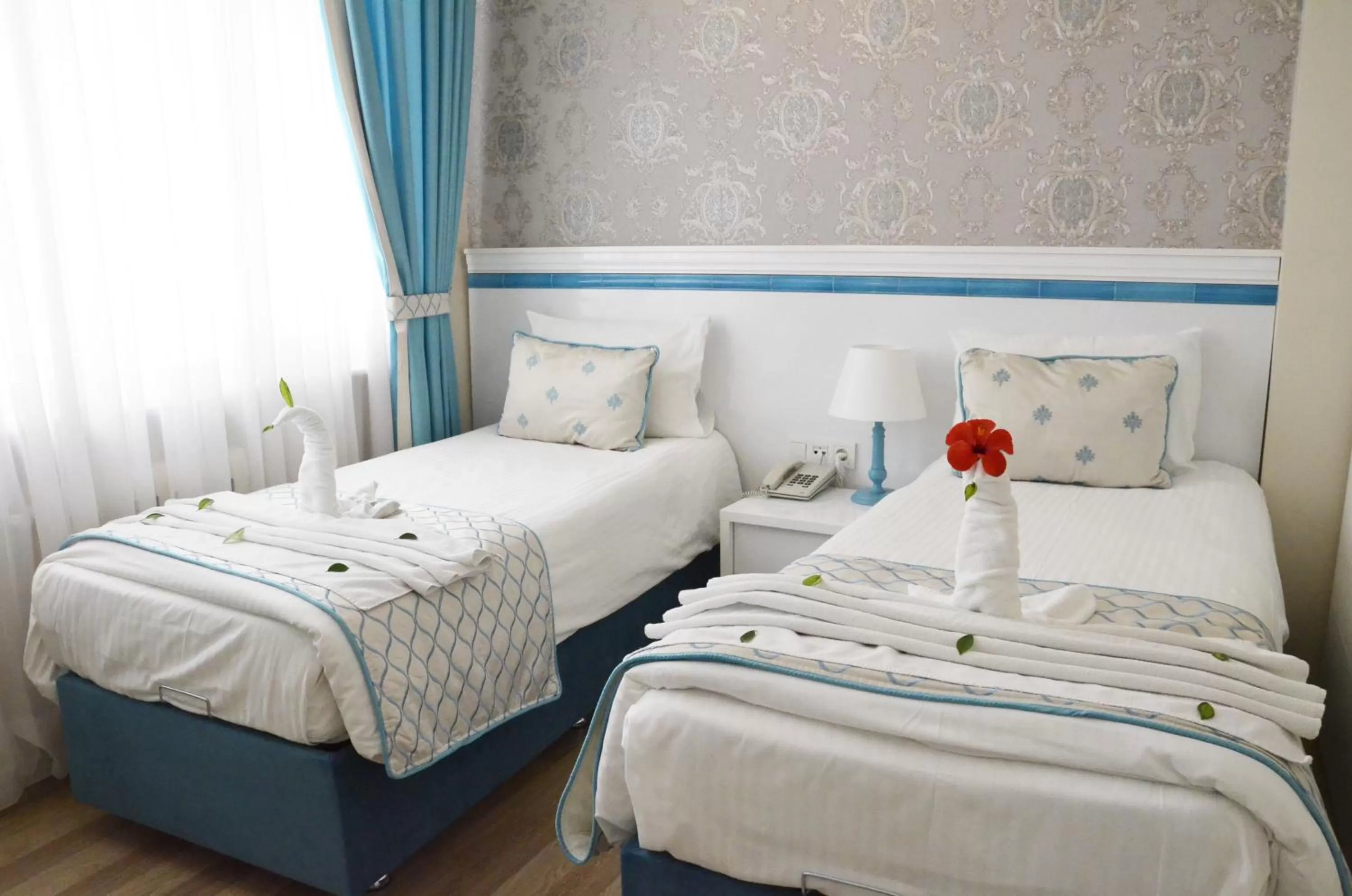 Bed in Star Holiday Hotel