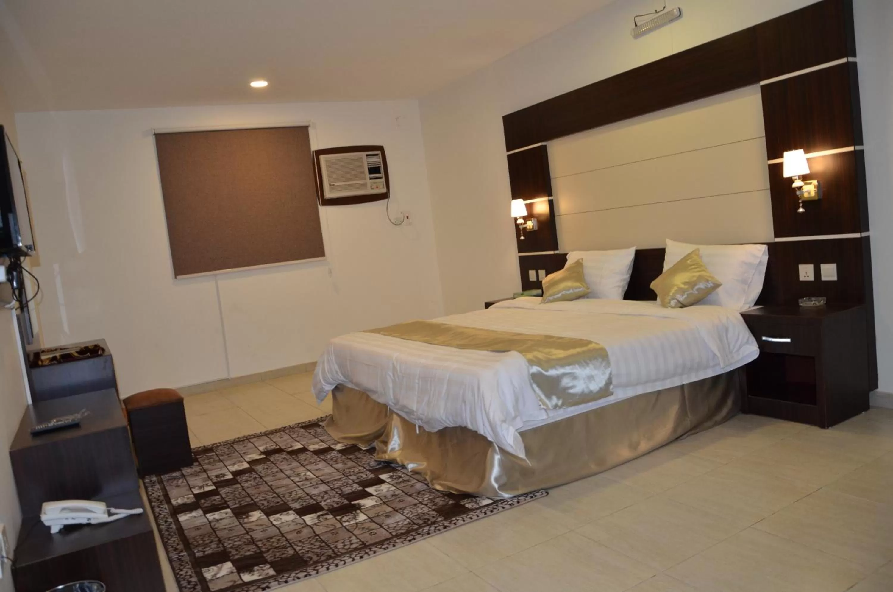 Bed in Jazan Heart Hotel