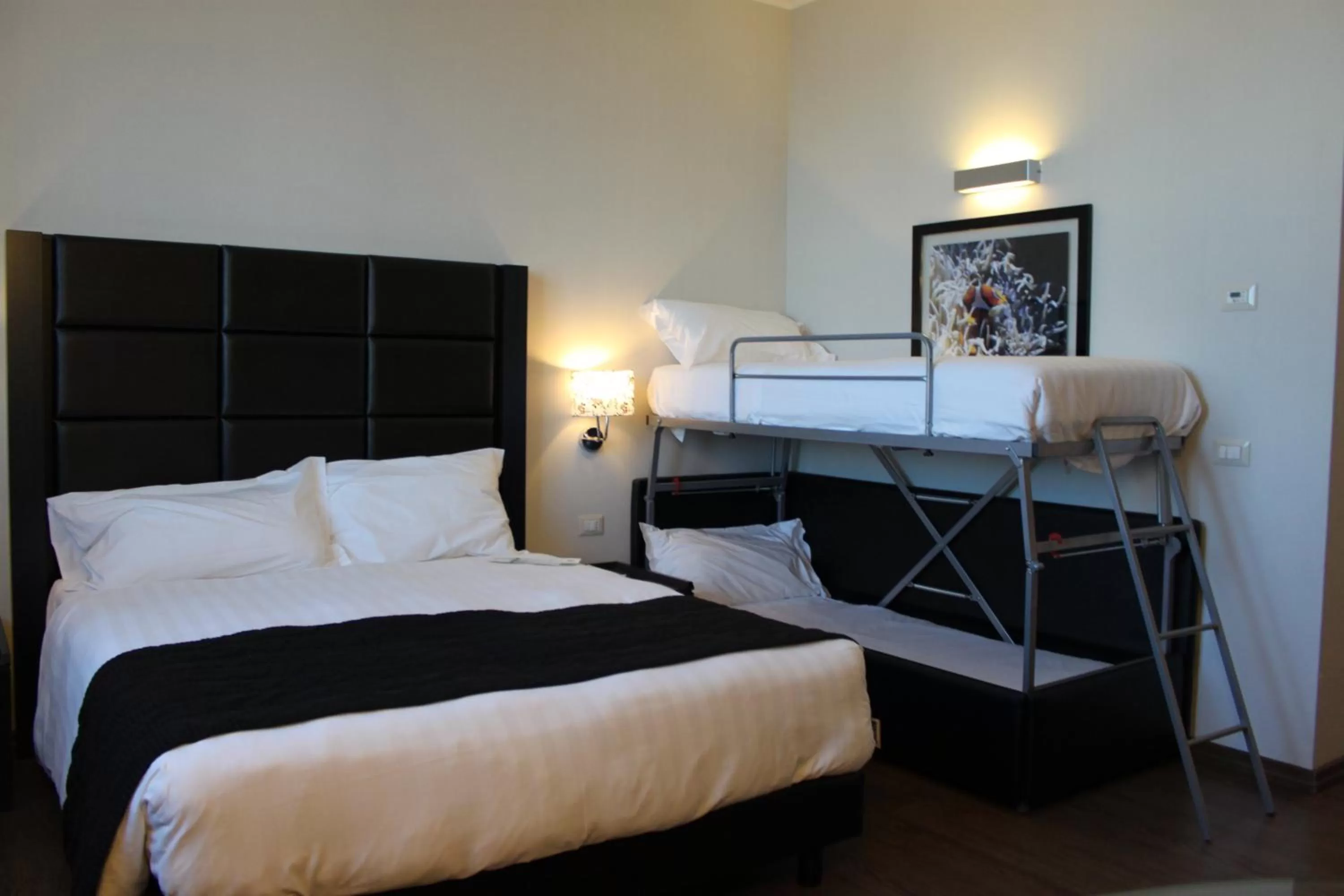 Photo of the whole room, Bed in Holiday Inn Genoa City by IHG