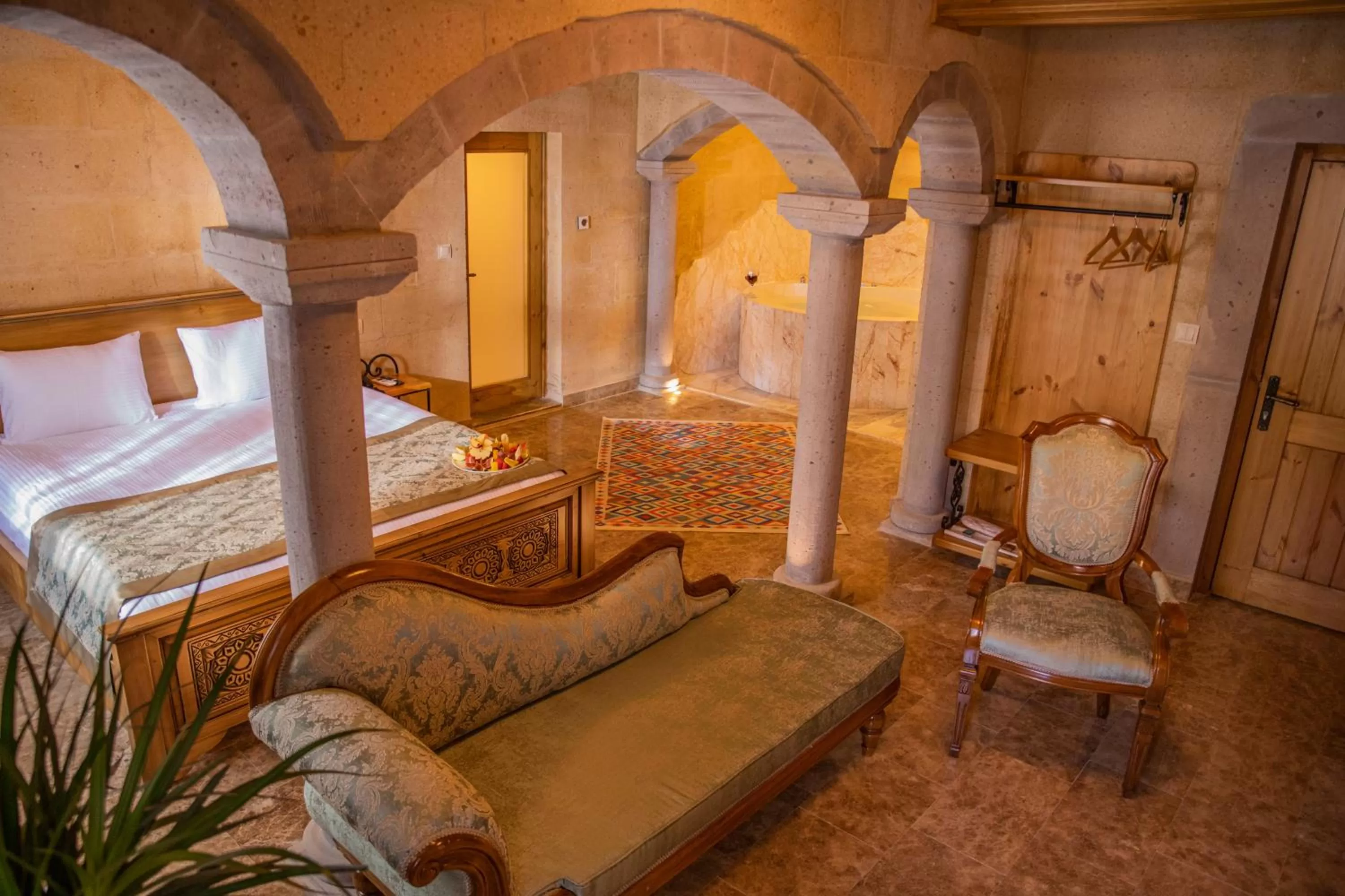 Seating area, Bed in Cratus Stone Palace