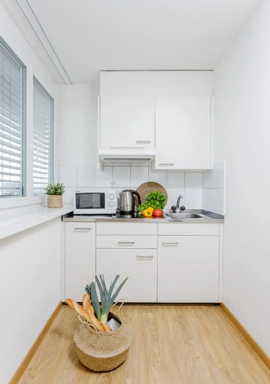 Kitchen or kitchenette in Swiss Star Tower - Self Check-In