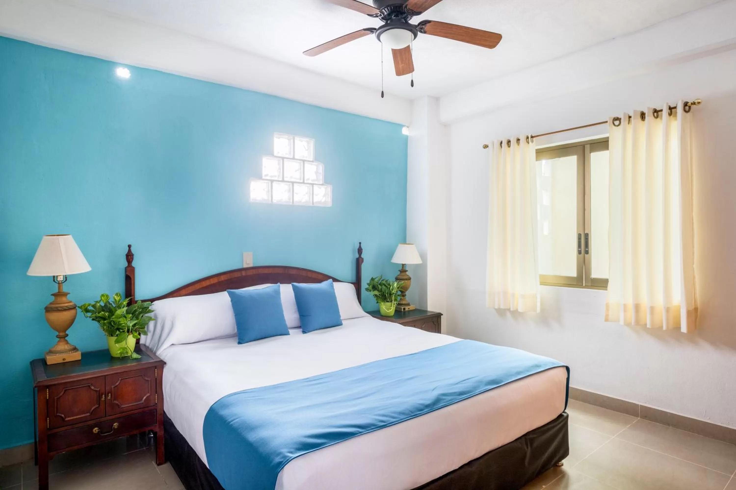 Bed in Hotel Pueblito Vallarta