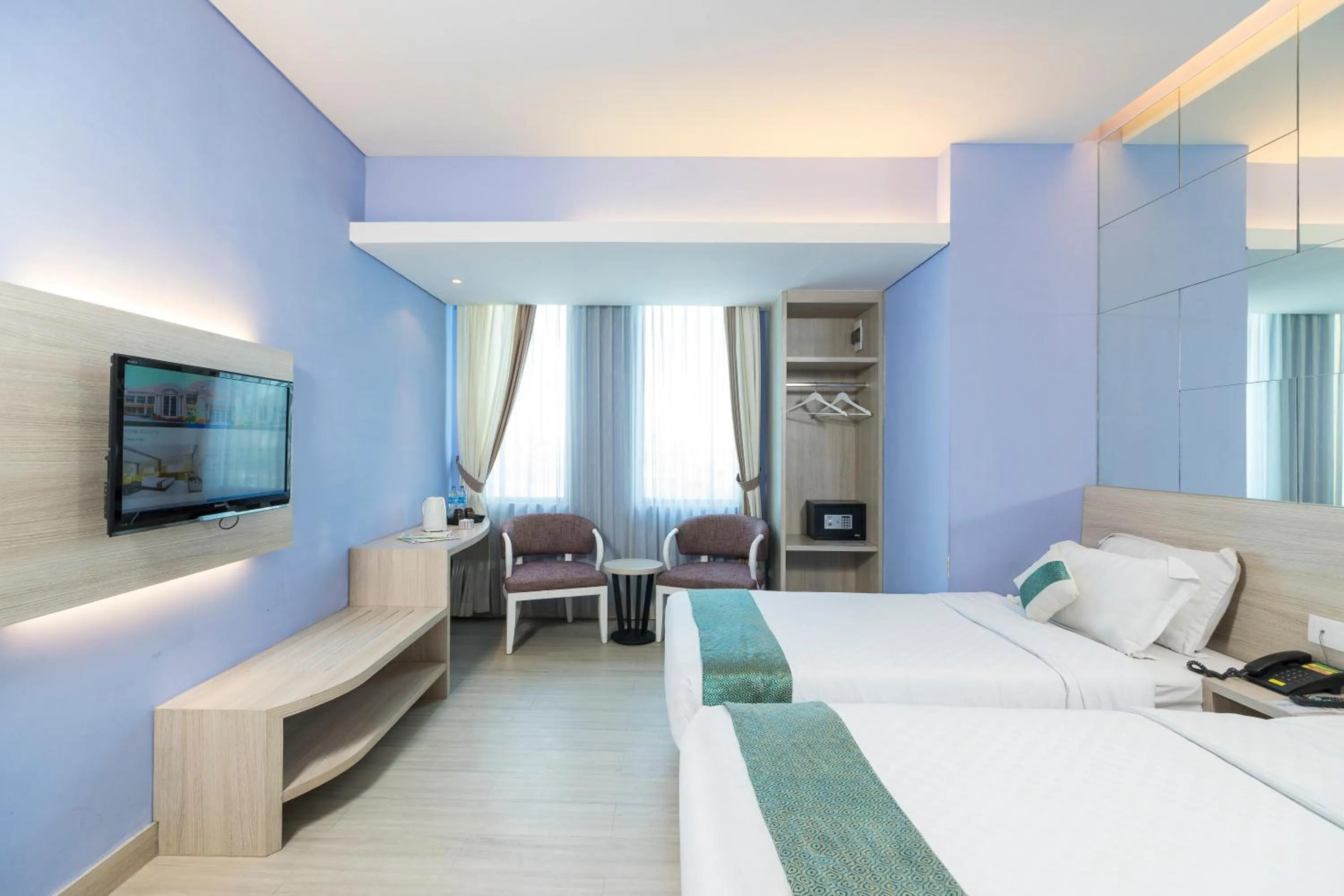 Photo of the whole room, Bed in Royal City Hotel Jakarta