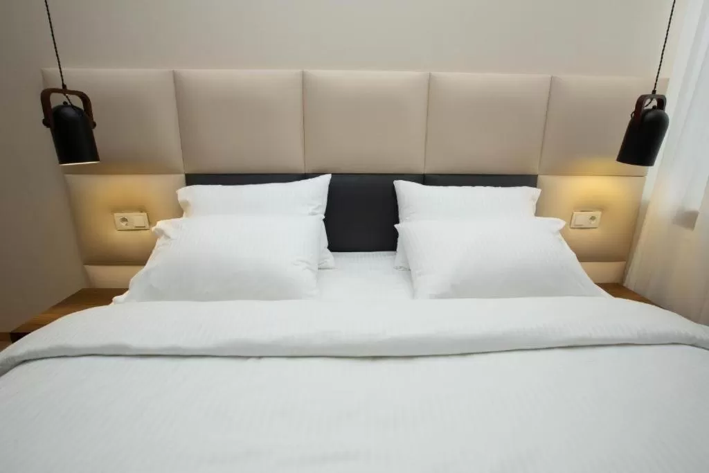 Bed in History Hotel Tbilisi
