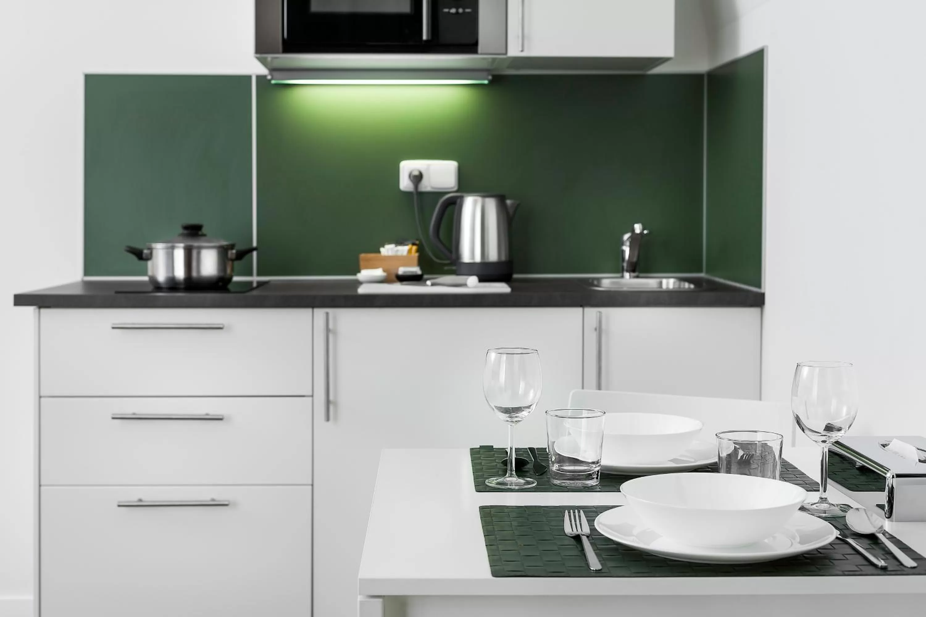 Kitchen or kitchenette in Elizabeth Suites