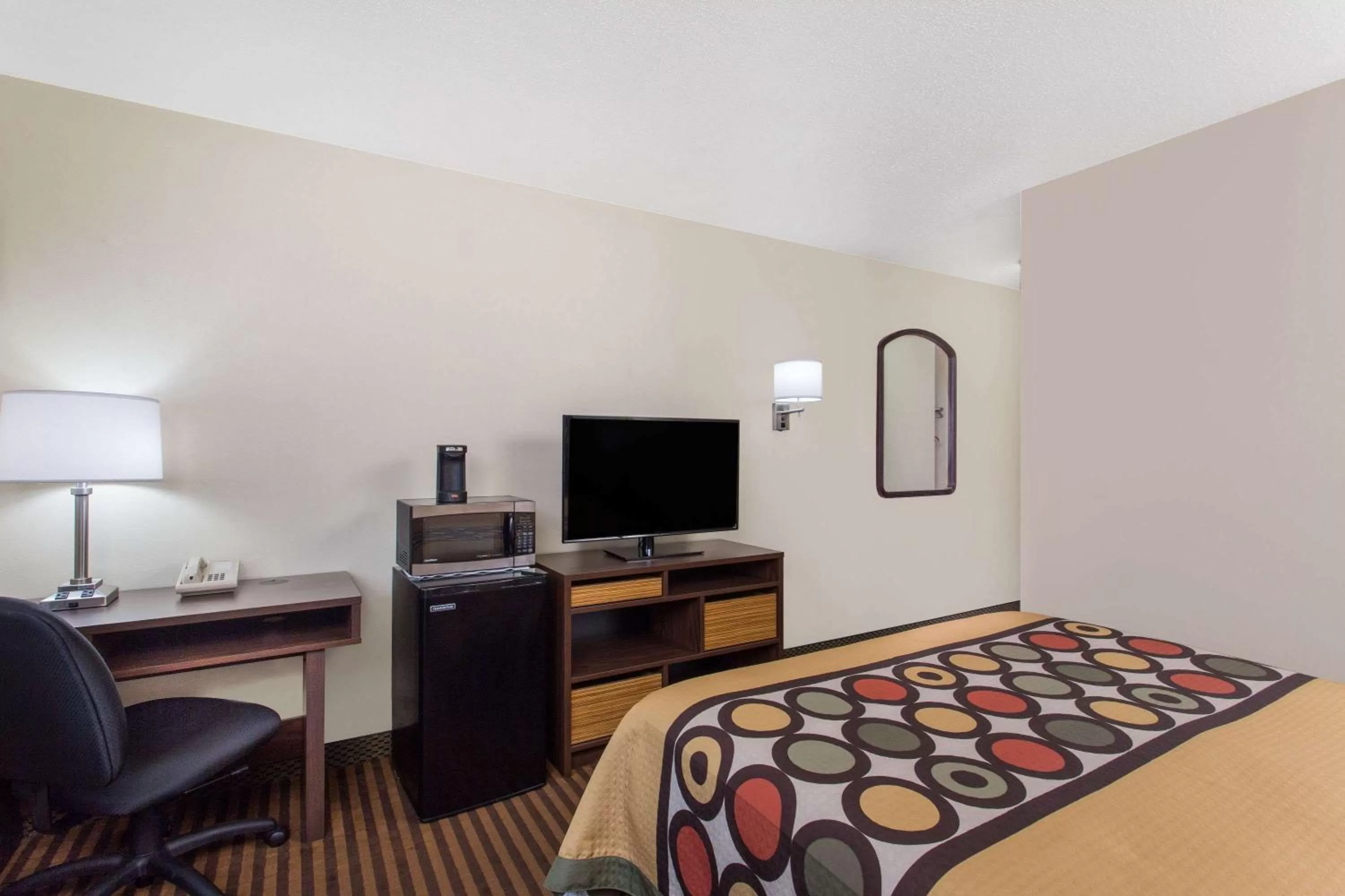 Photo of the whole room, TV/Entertainment Center in Super 8 by Wyndham Eau Claire I-94