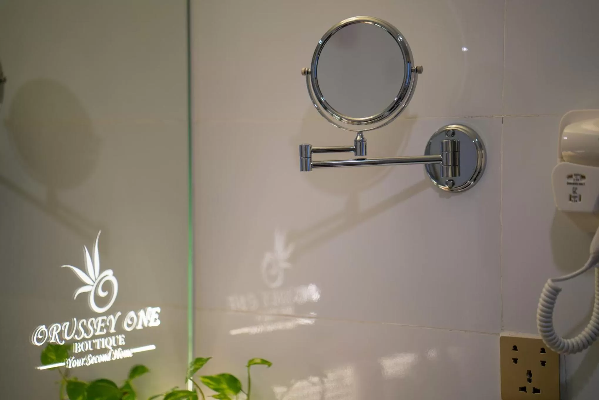 Property logo or sign in Orussey One Boutique