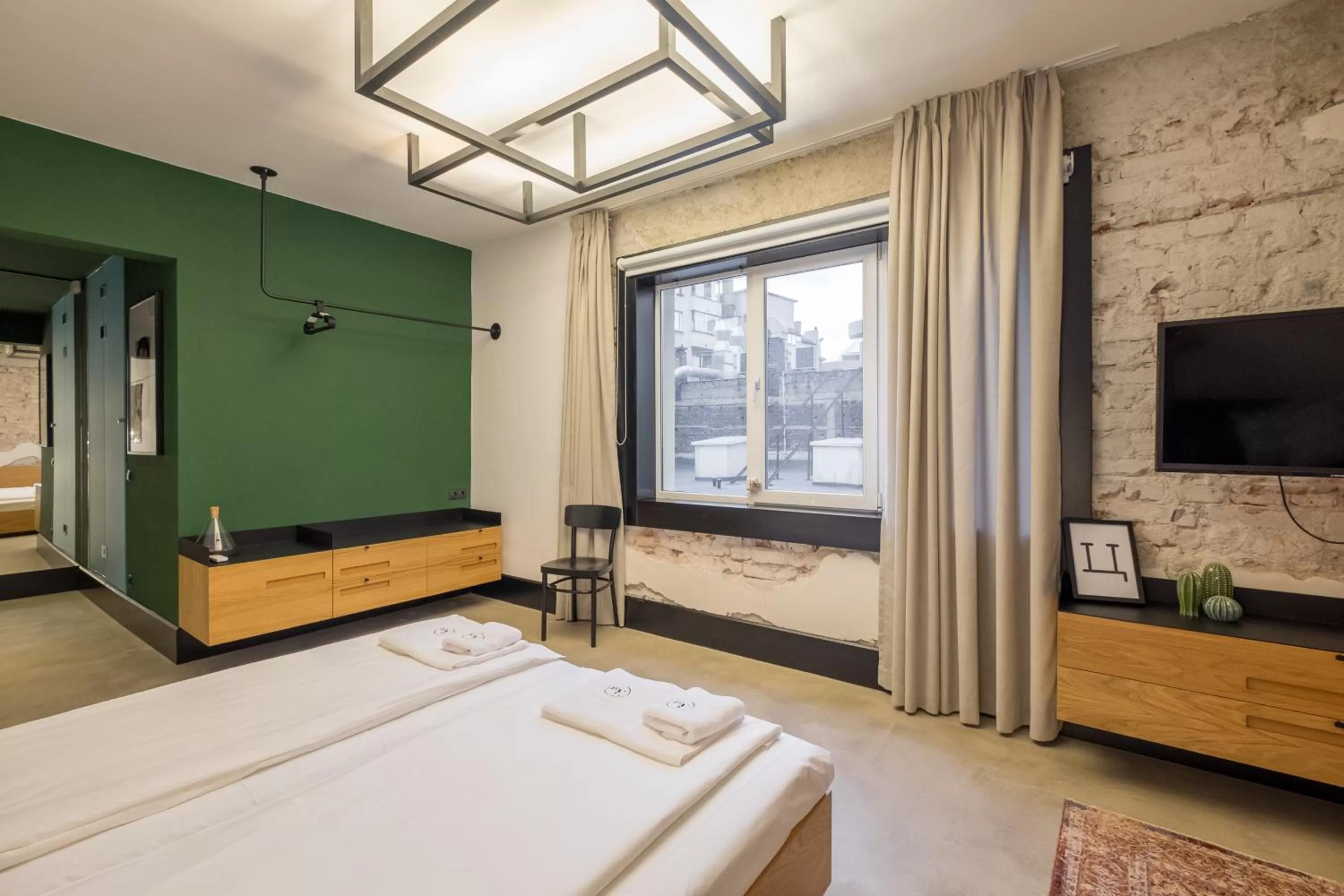 Bed in R34 Boutique Hotel