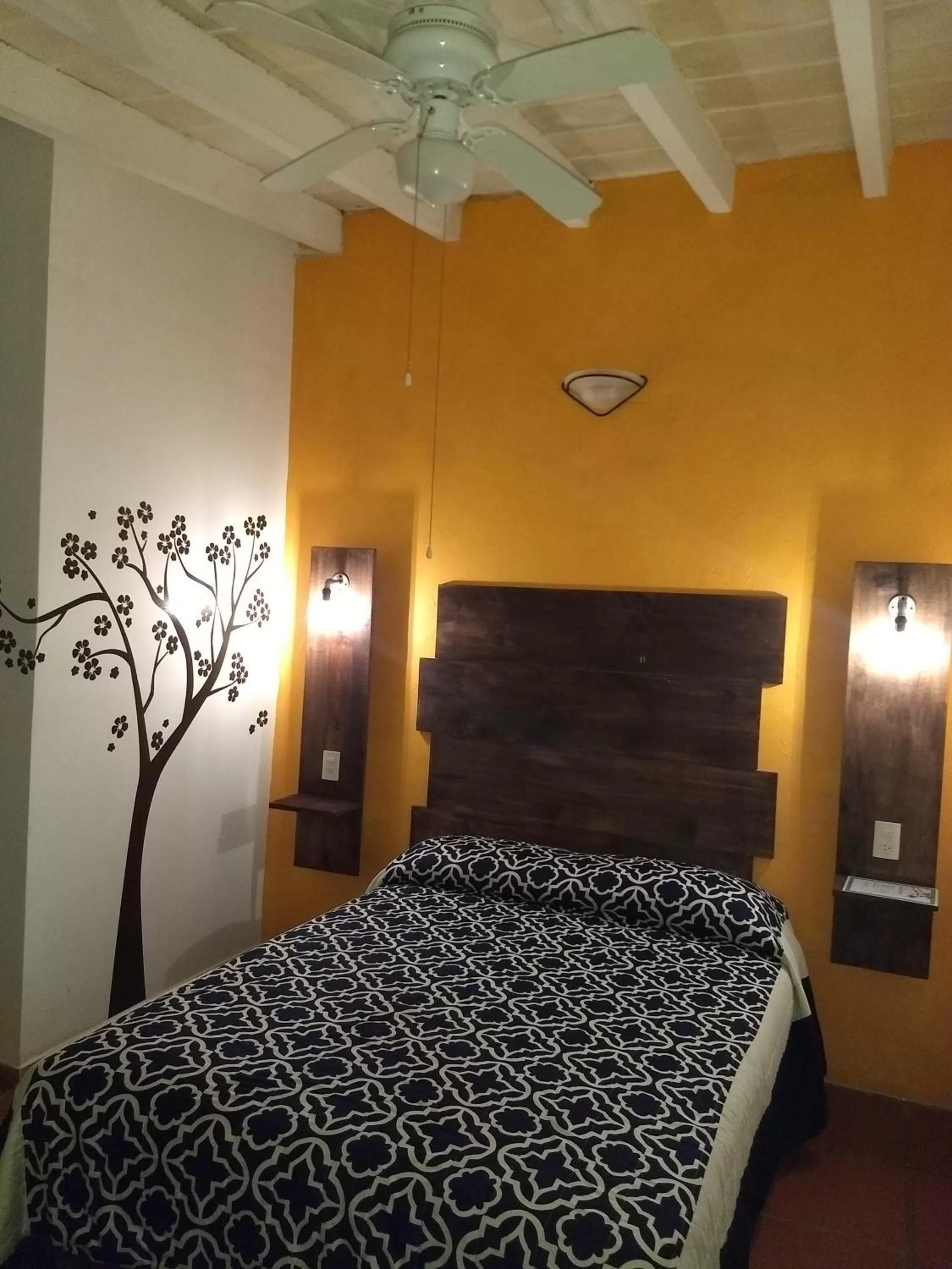 Bed in Posada Casa Topiltzin