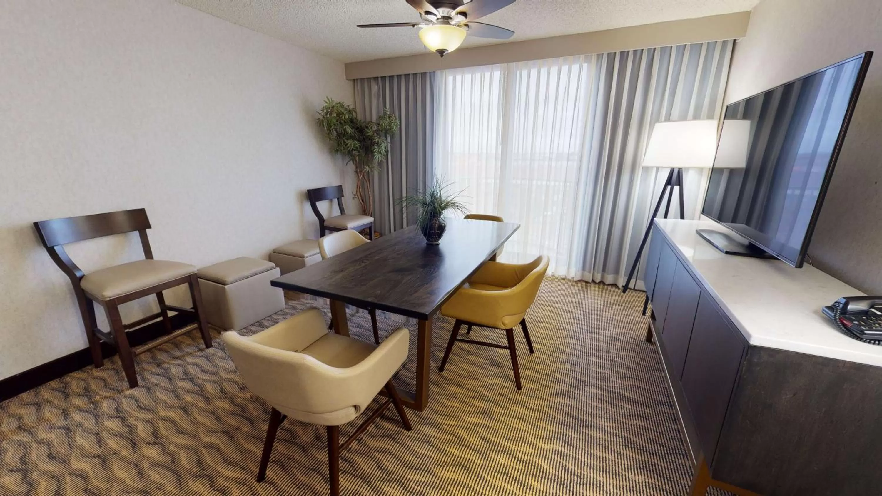 Living room in Embassy Suites by Hilton Oklahoma City Will Rogers Airport