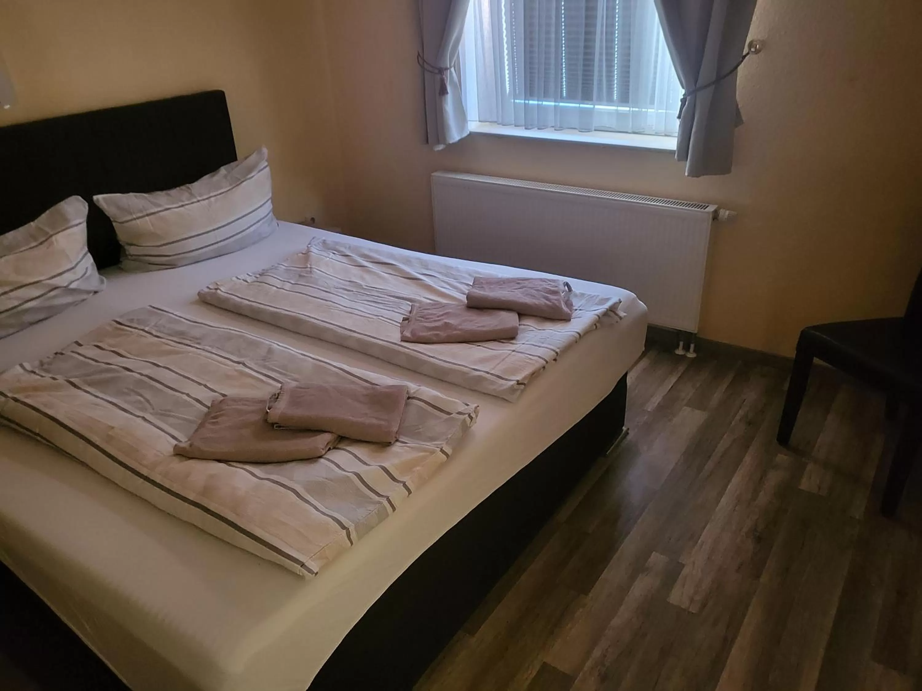 Bed in Pension Kuehnauer Hof