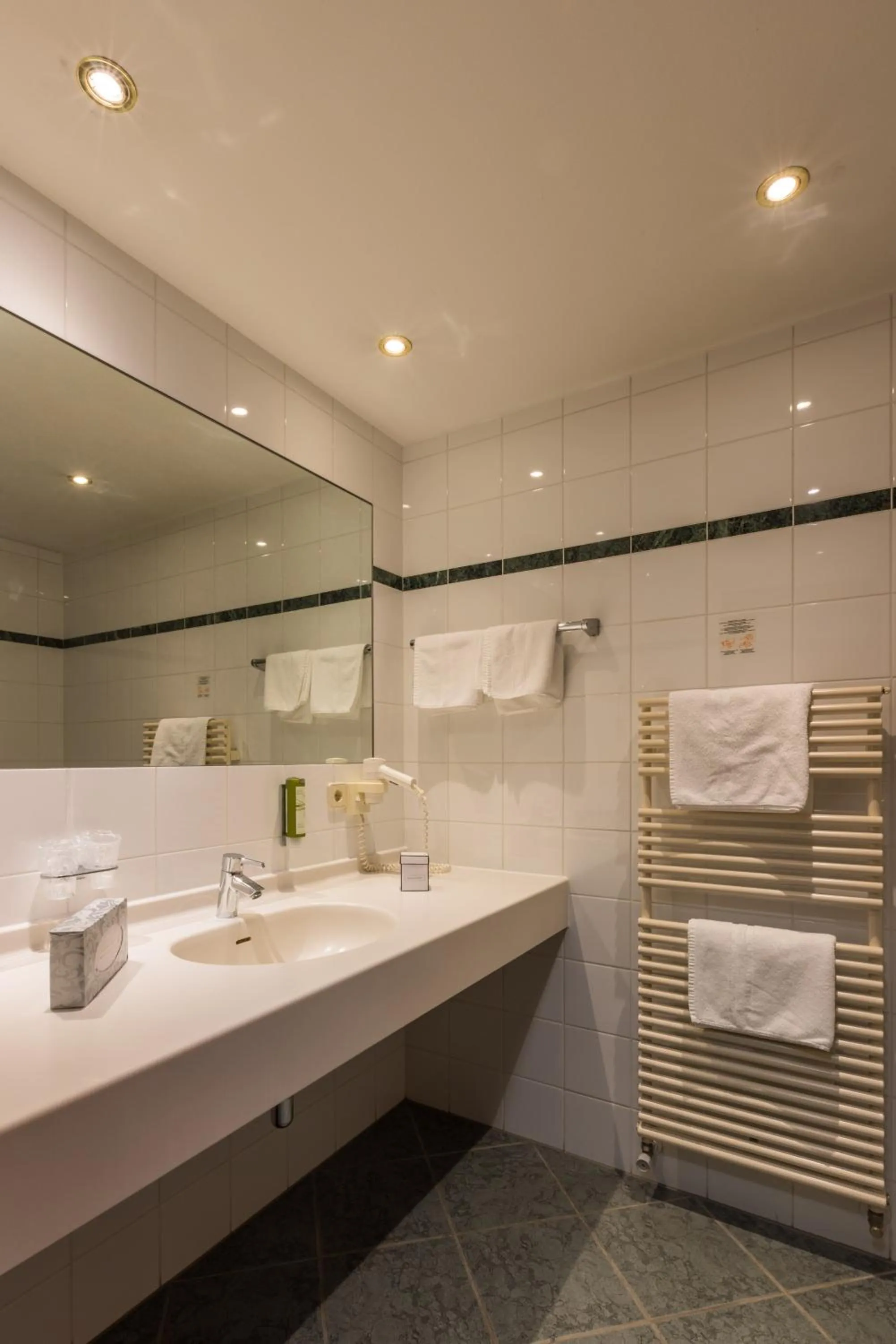 Bathroom in MANNI das Hotel