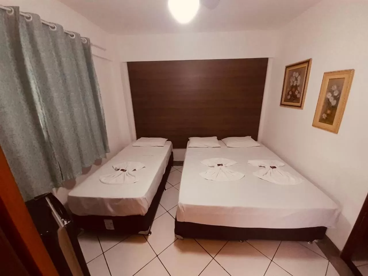 Bed in Flamingo Beach Pousada