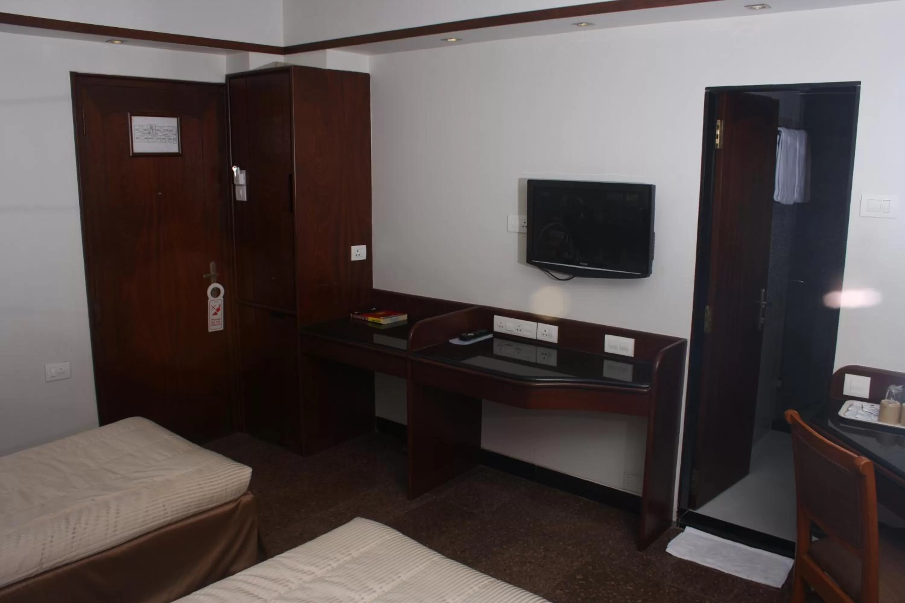 Bed in Hotel Karl Residency