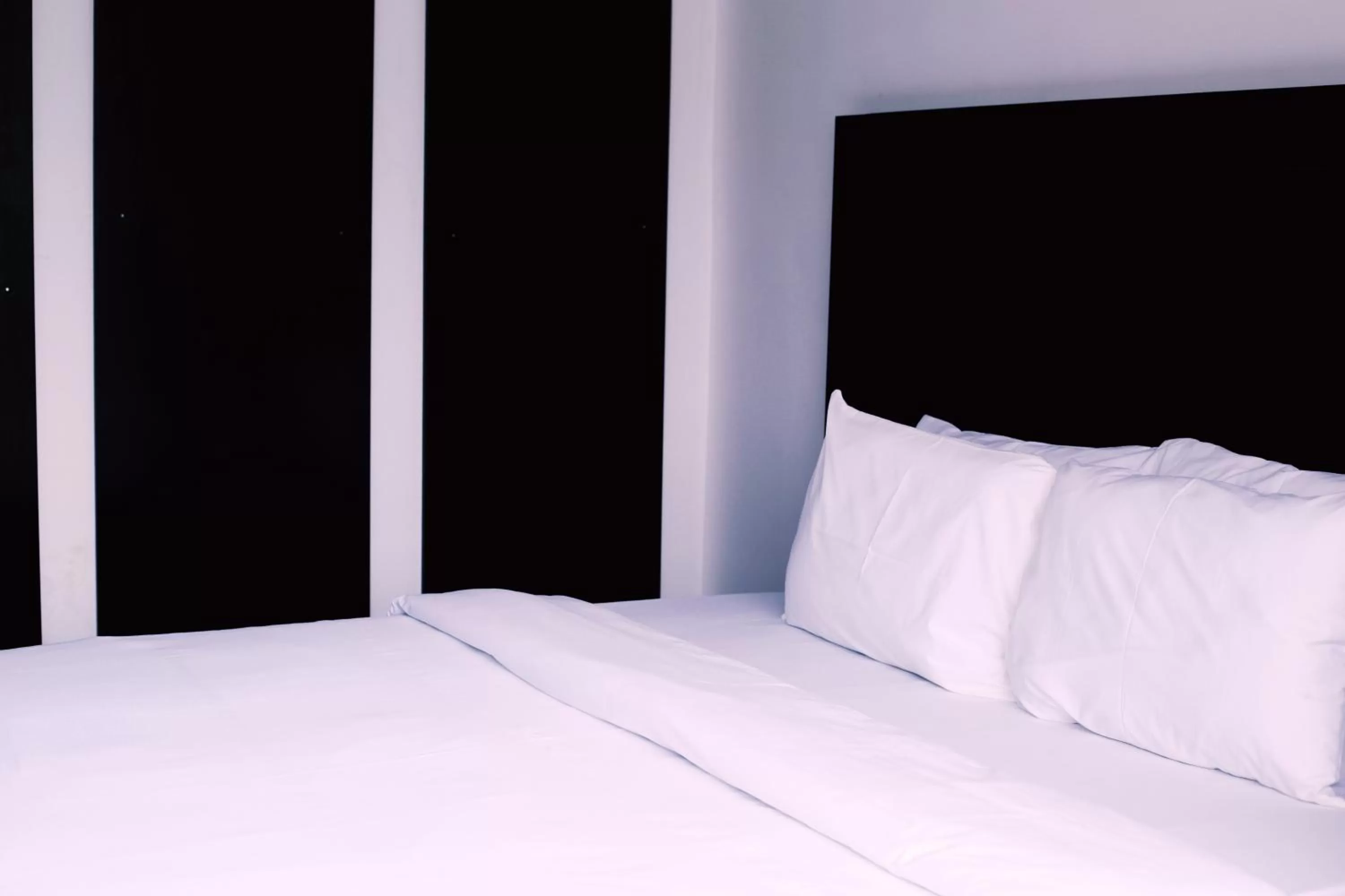 Bed in Hotel Capitol