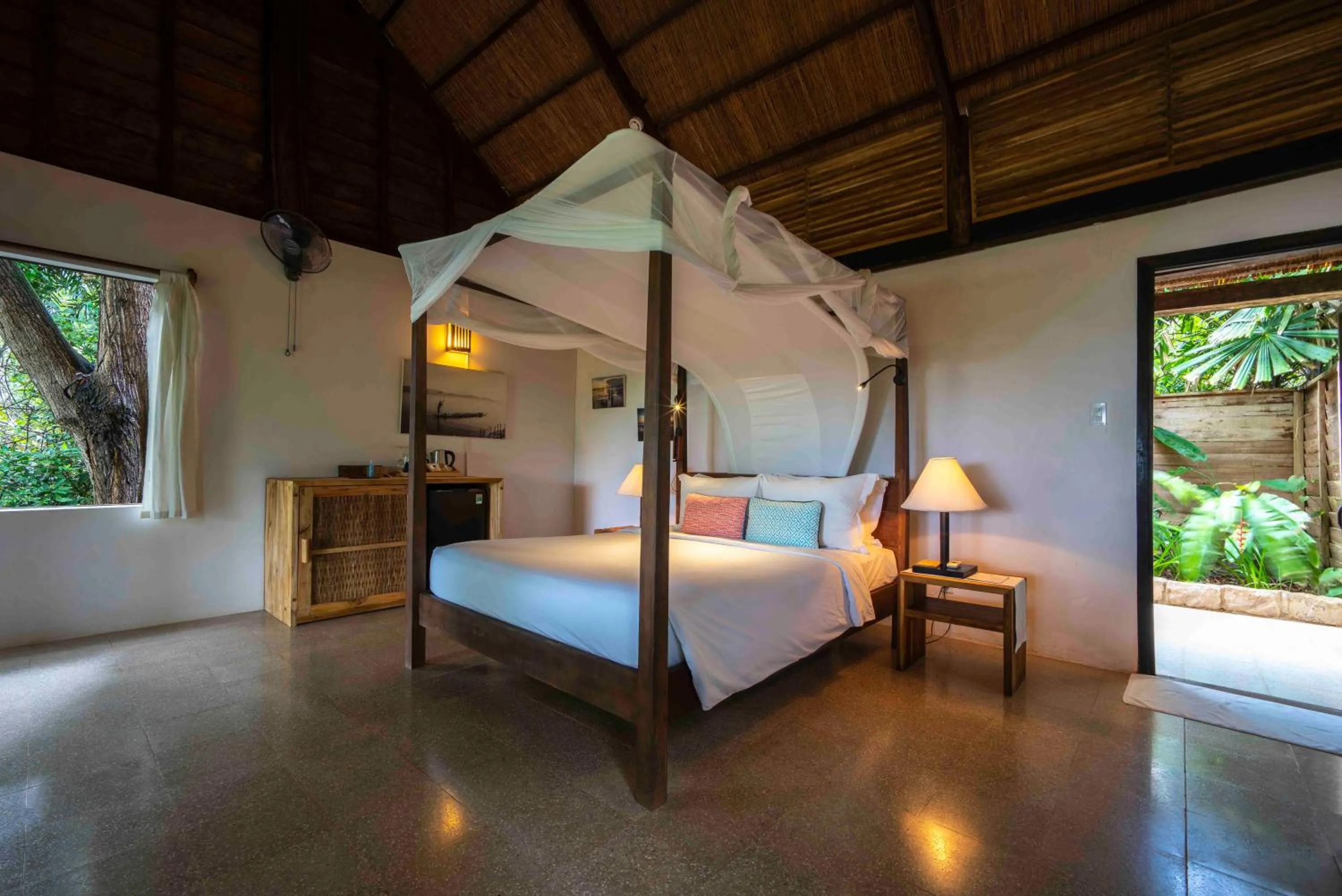 Bed in Mango Bay Resort