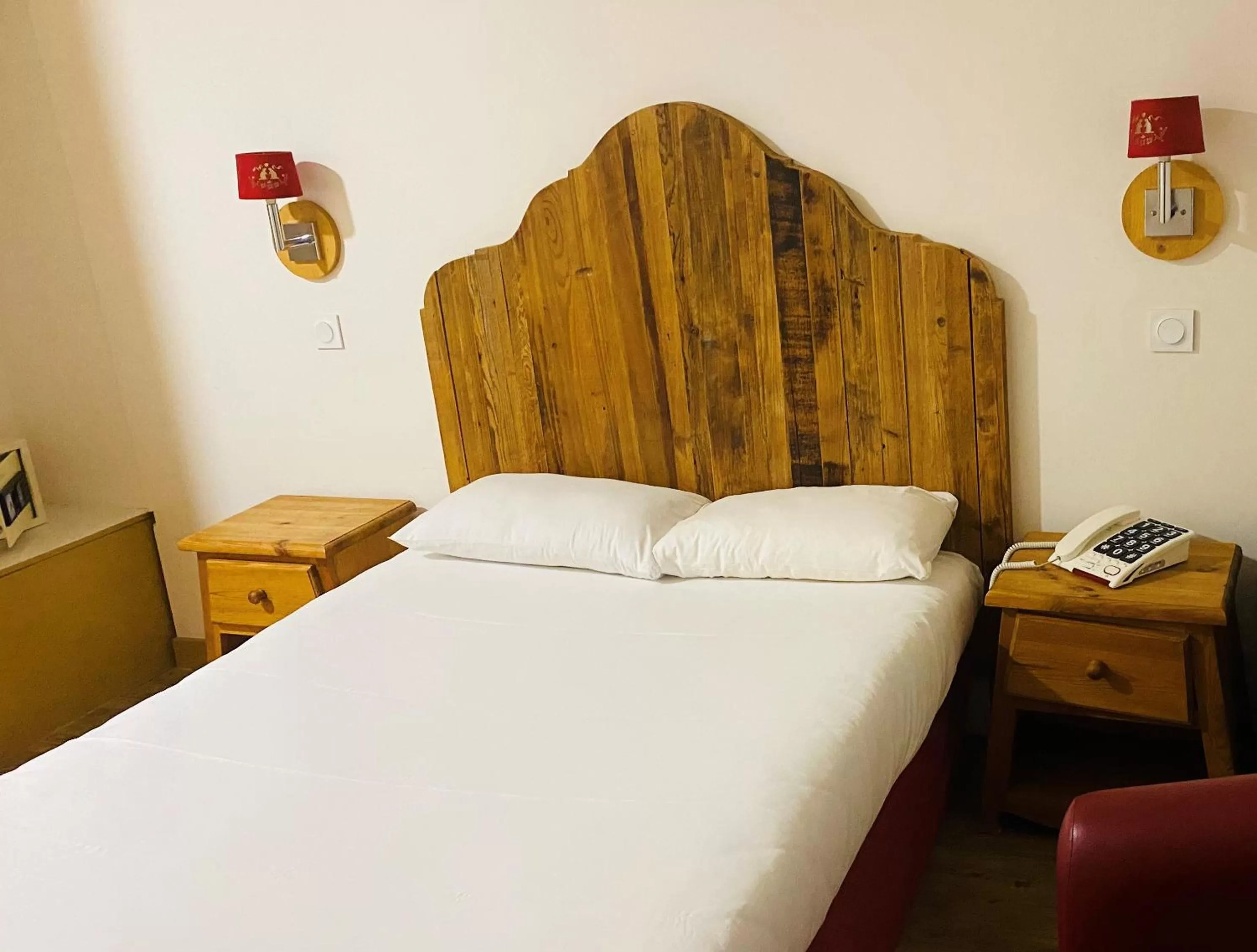 Bed in Hotel Martinez Grenay