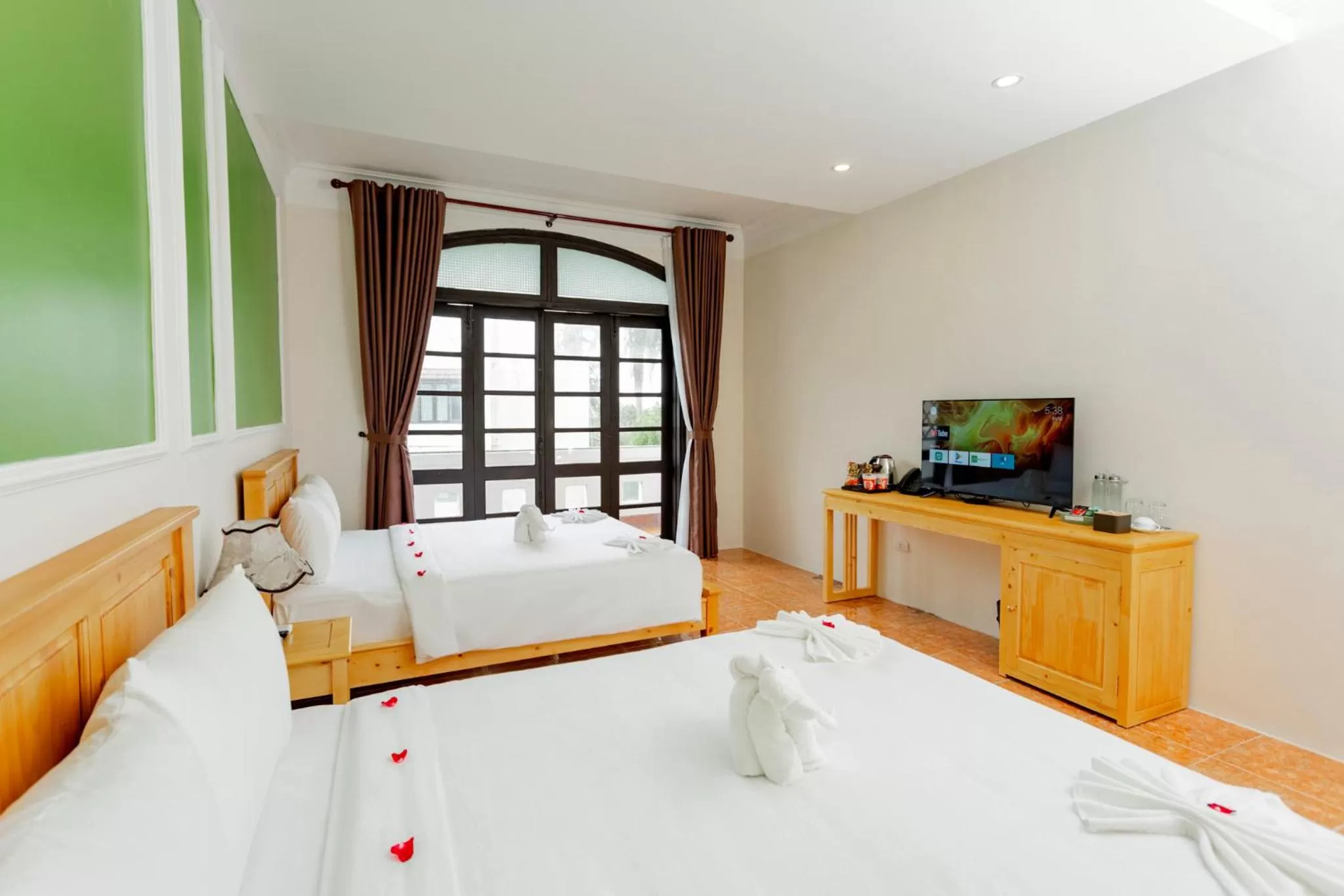 Photo of the whole room, Bed in Sea and Sand Hotel