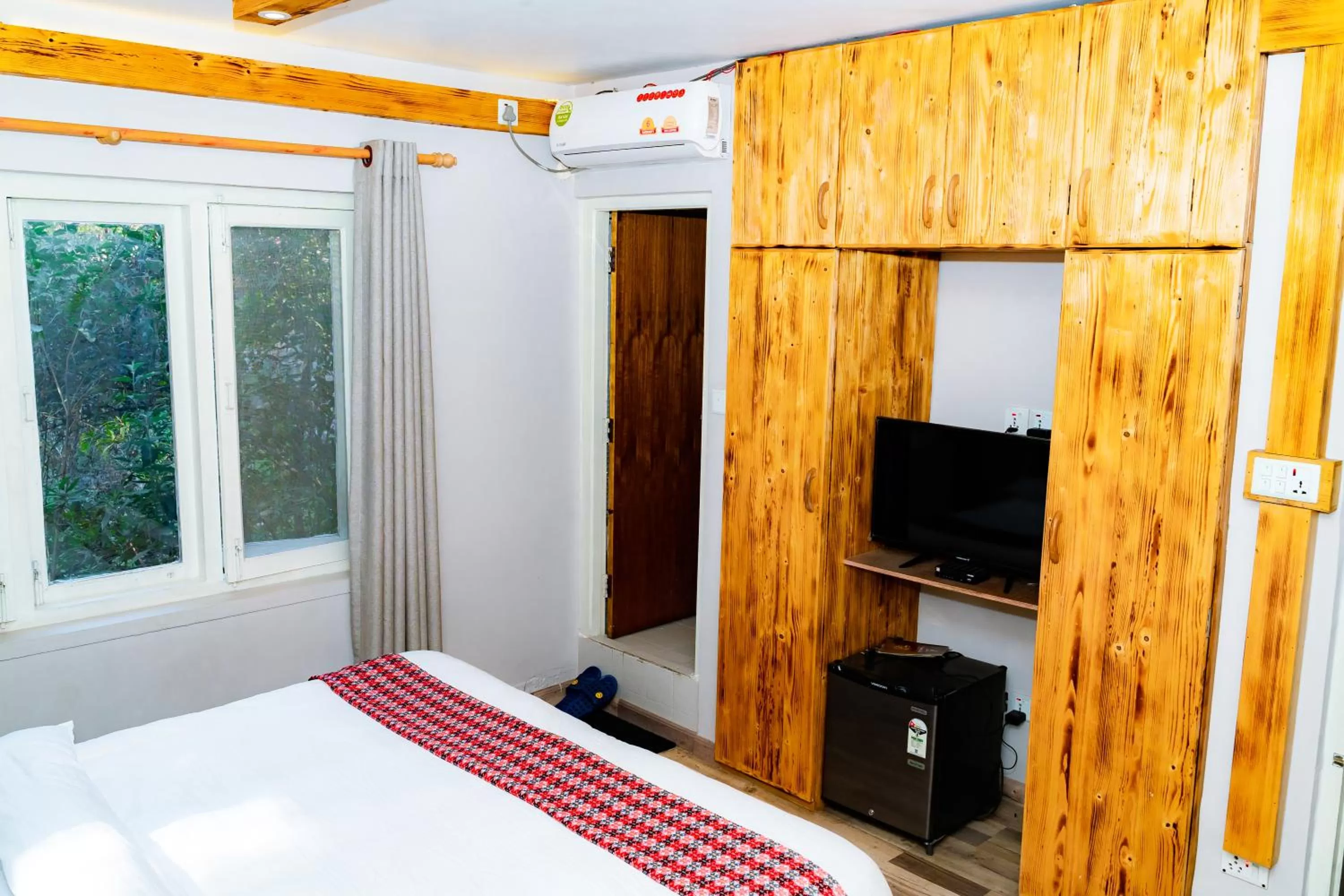 TV and multimedia, TV/Entertainment Center in Silu Homes by Hostmandu