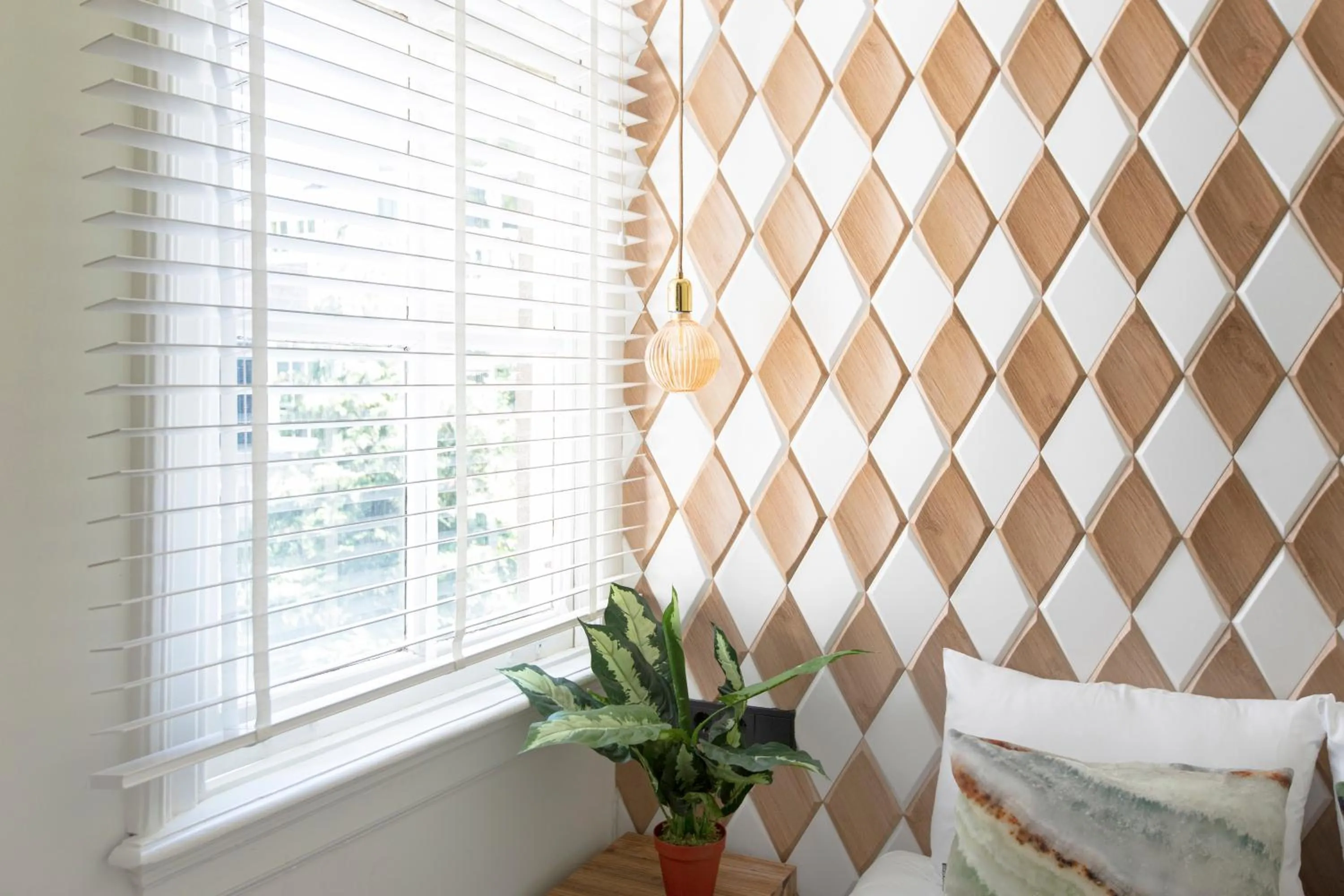 Decorative detail, Bed in Quentin Golden Bear Hotel