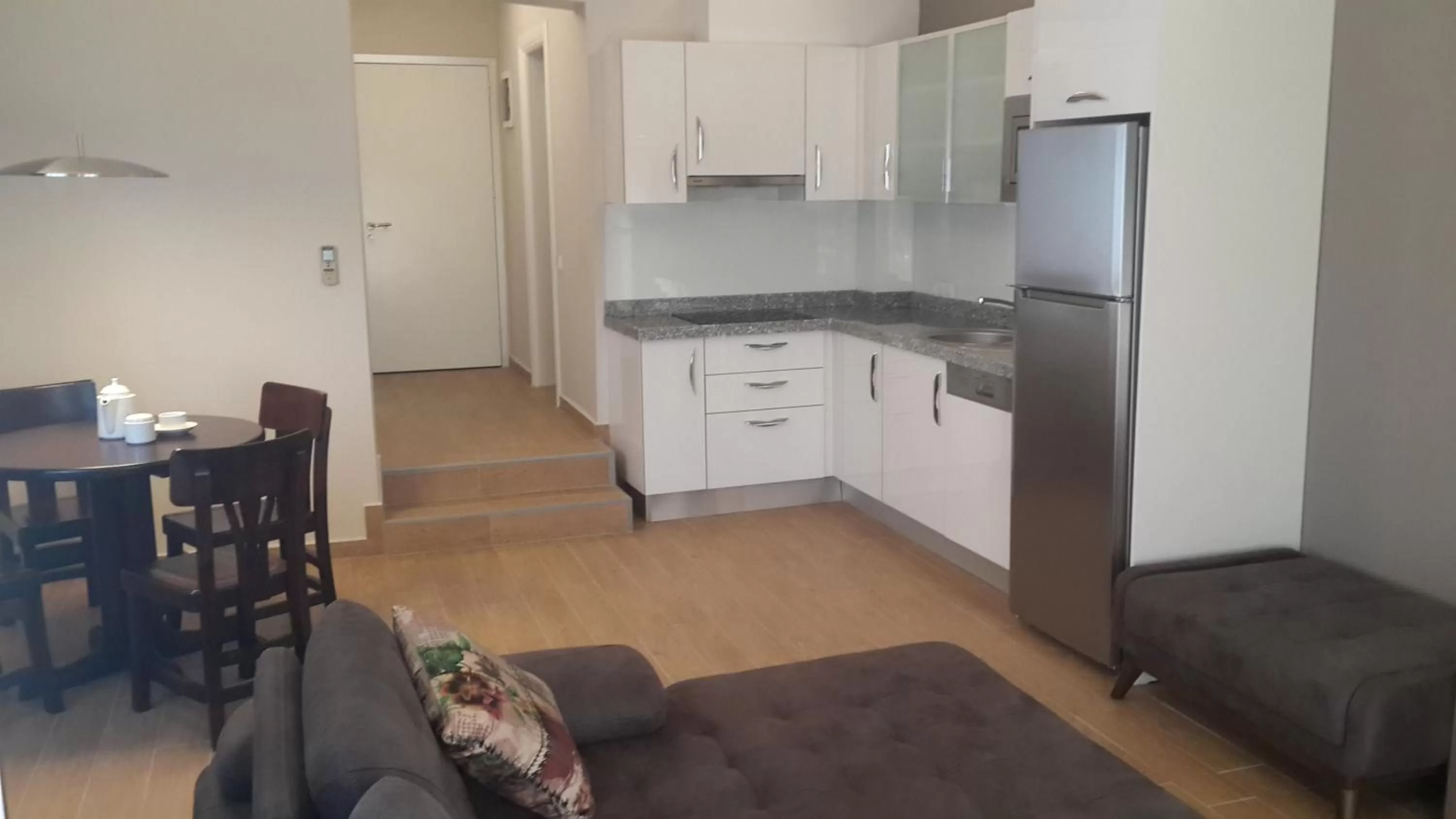 Kitchen or kitchenette in Sun Garden Apart Hotel