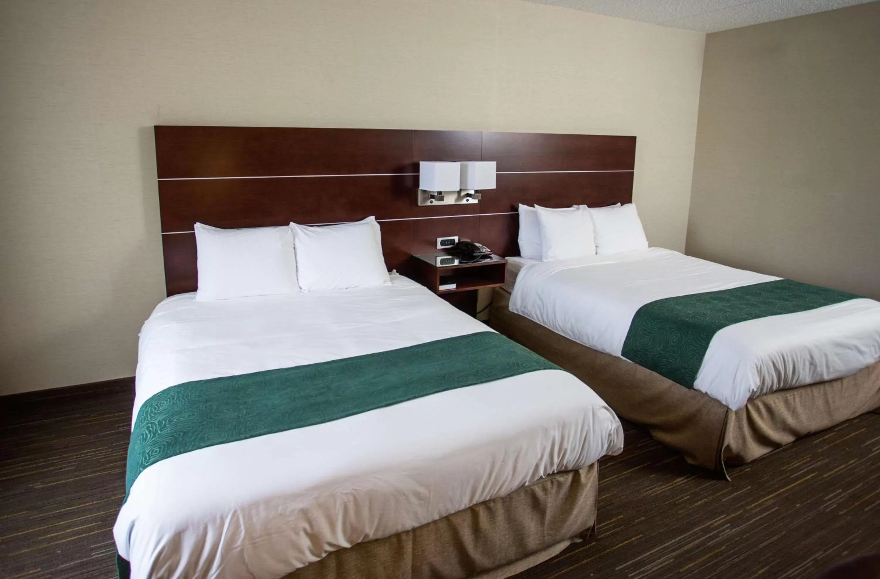 Photo of the whole room, Bed in Wyndham Moline on John Deere Commons
