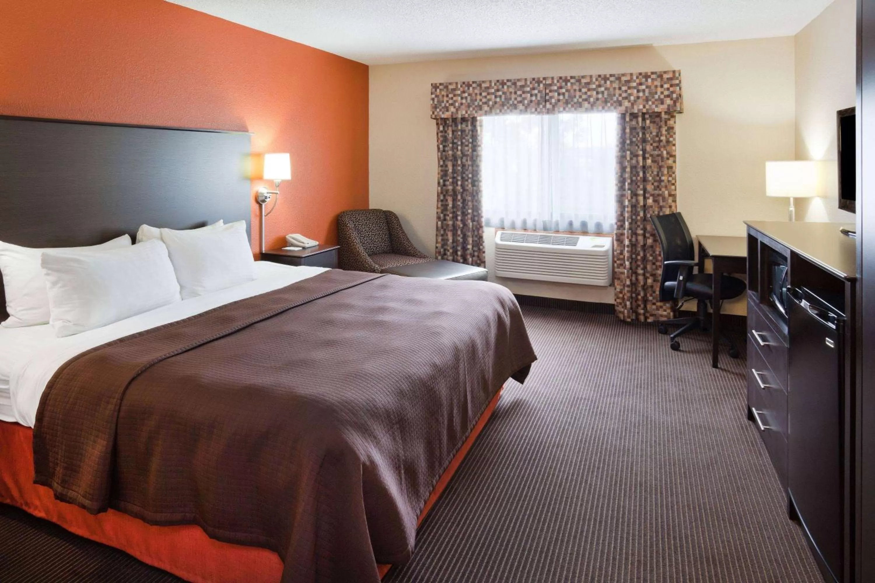 Photo of the whole room, Bed in AmericInn by Wyndham Plover Stevens Point