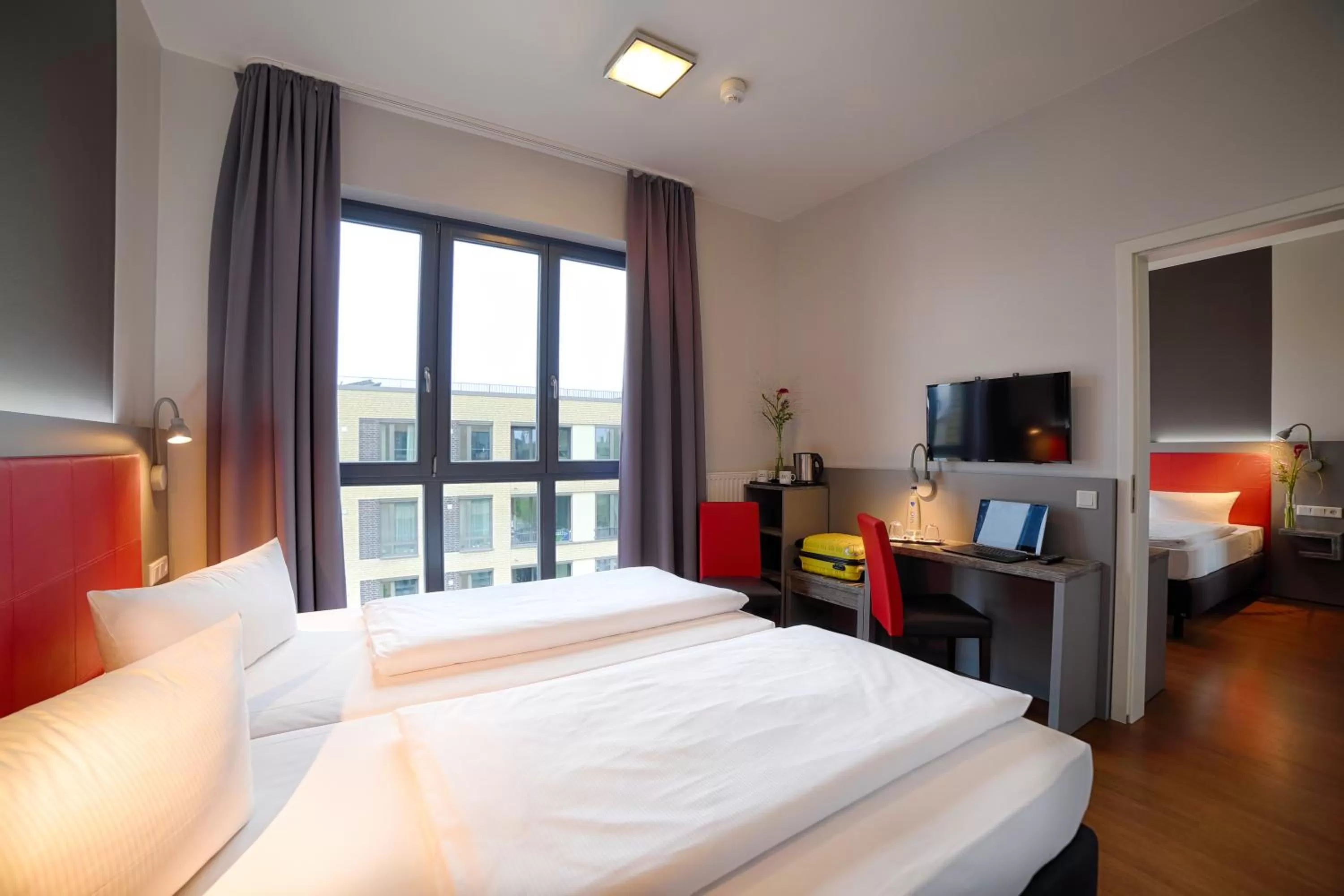 Photo of the whole room, Bed in H+ Hotel 4Youth